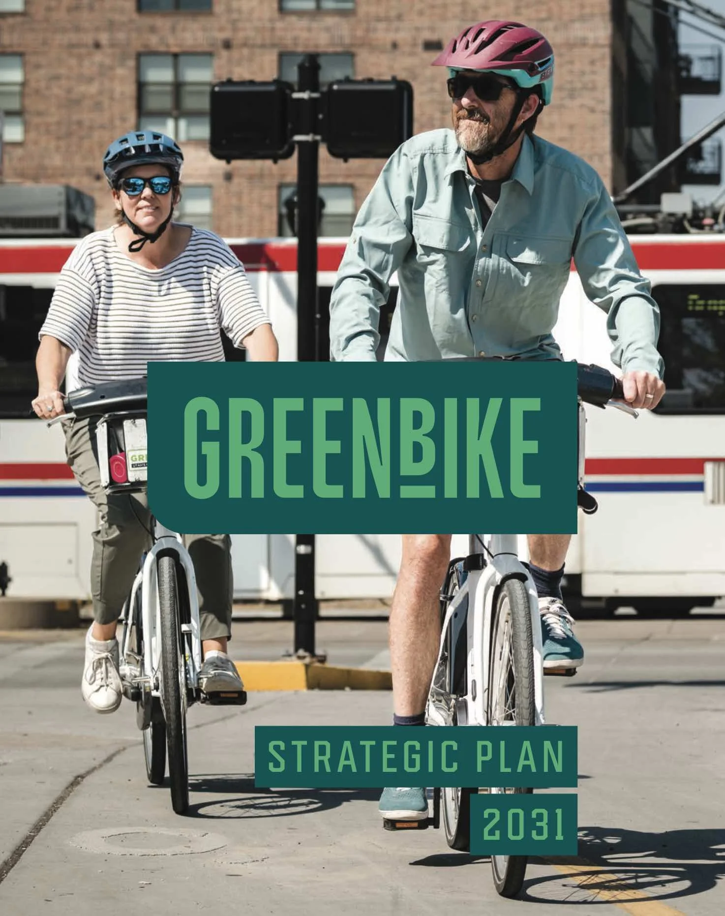 Cover of strategic plan with two people biking