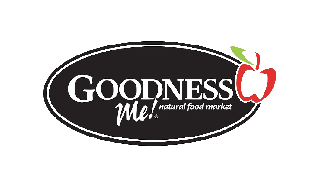goodness me logo in white text on a black oval with a red apple and green leaf on the right side