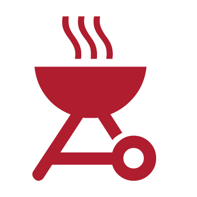 Icon of a barbecue grill with steam rising from it.