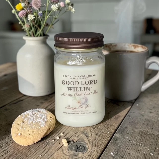 Good Lord Willin coffee scented candle in a mason jar with sugar cookies by coconuts and cornbread candle company