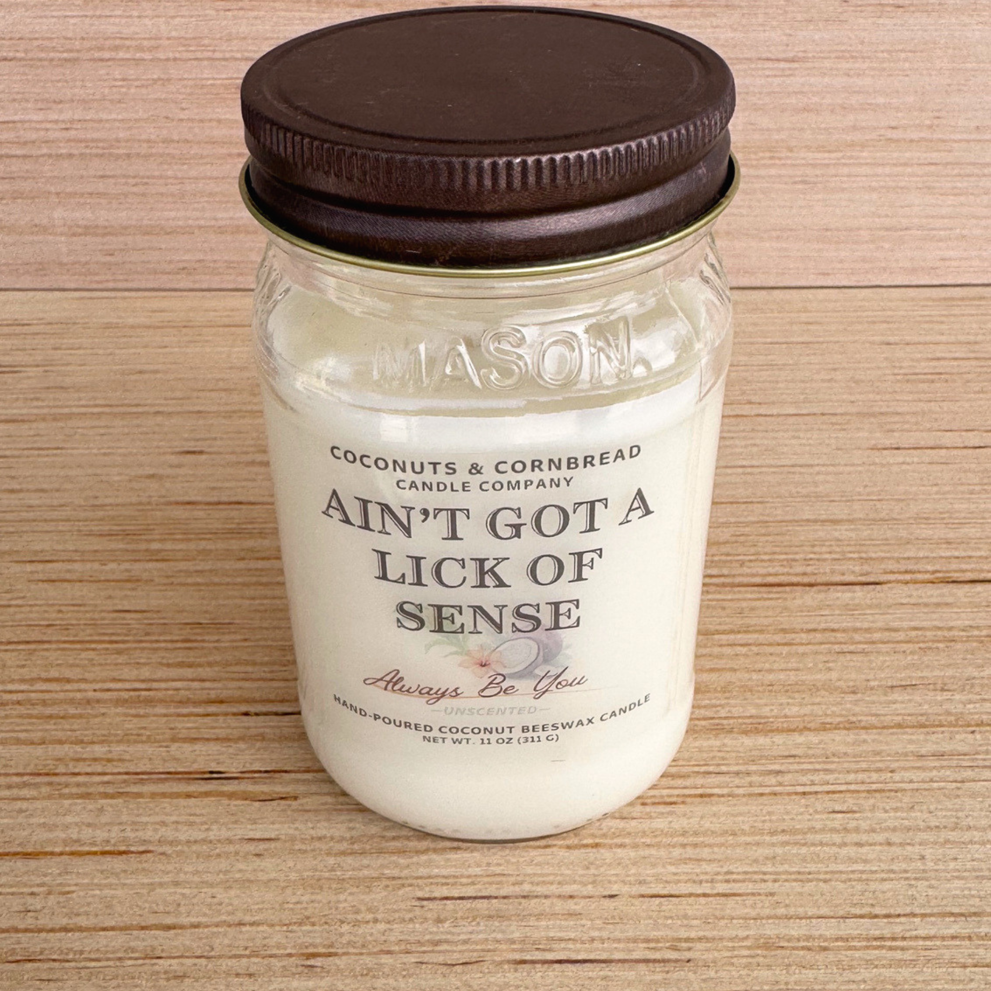 ain't-got-a-lick-of-sense-unscented-candle.png