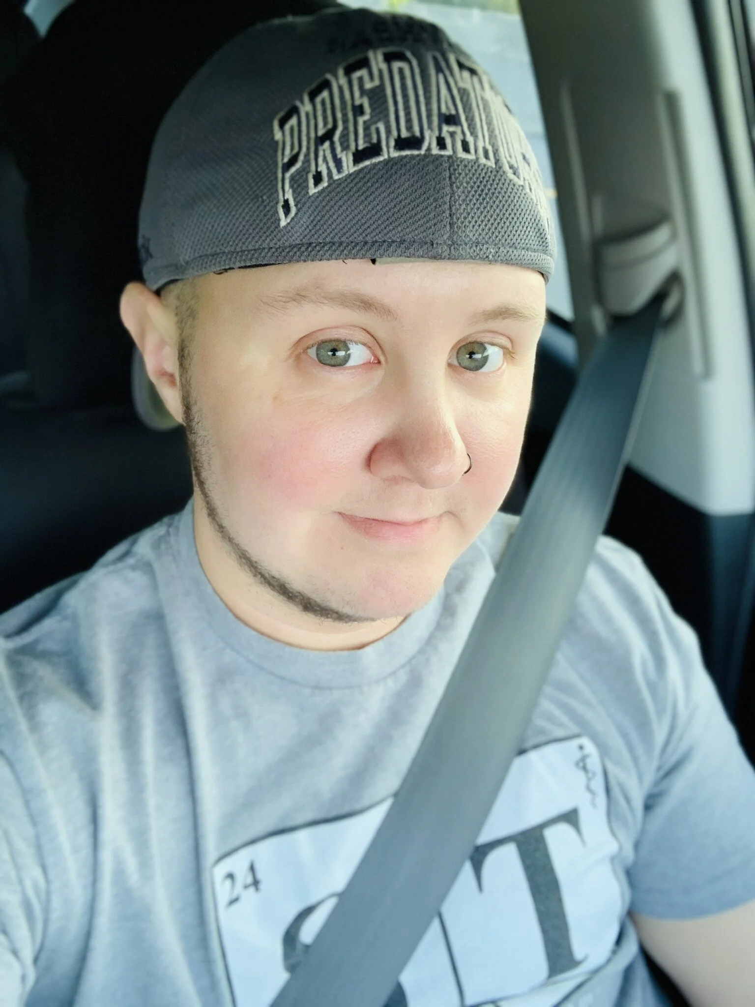 A selfie of Adam in a car.