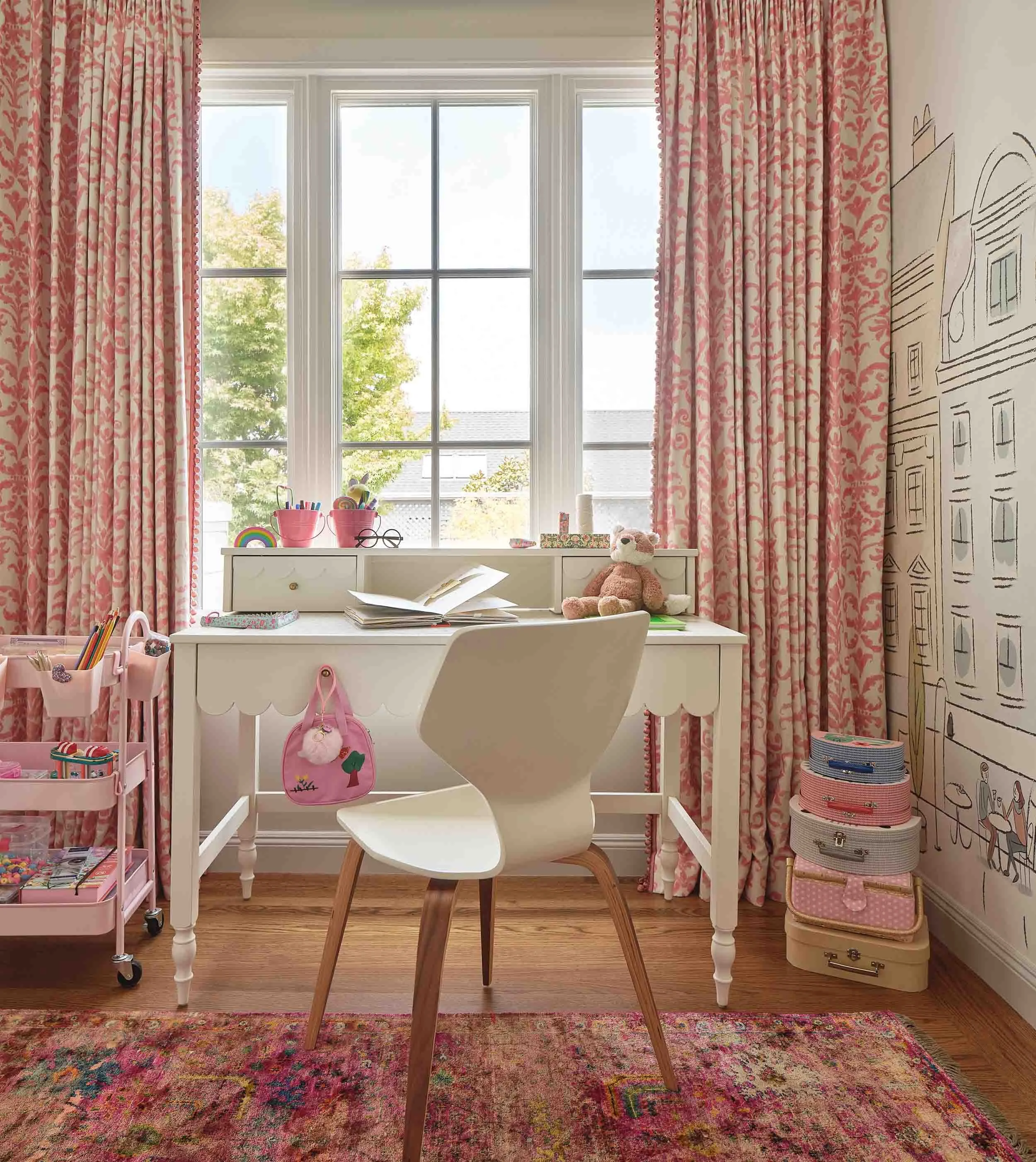 ncc-victorian-renovation-girls-bedroom-pink-curtains-cityscape-mural-desk.jpg