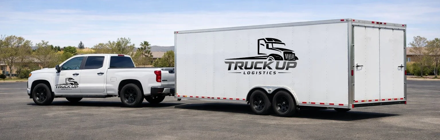White pickup truck with a black logo that says "TRUCK UP LOGISTICS" on the door, attached to a white enclosed trailer with the same logo