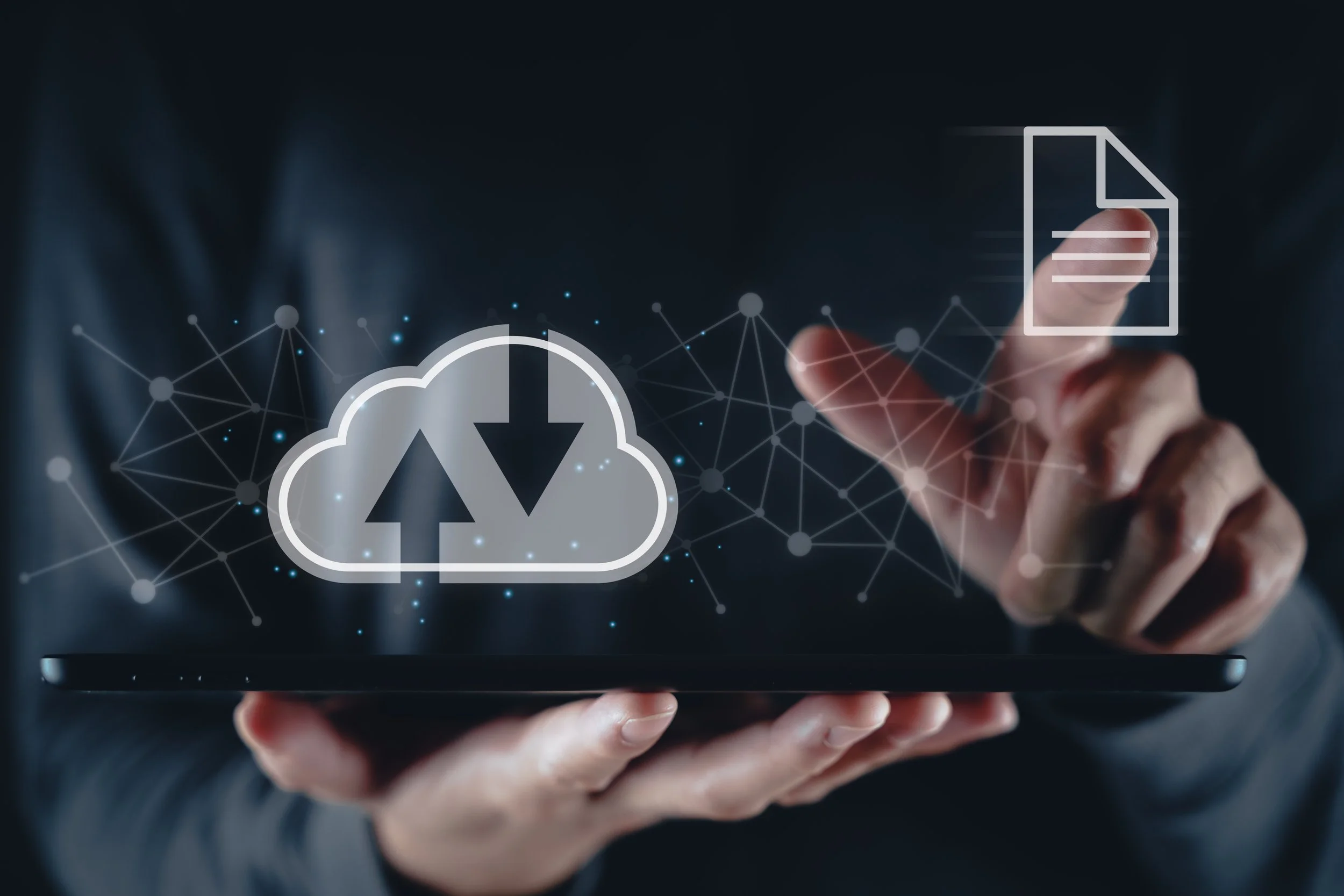 Person holding a tablet with digital cloud download icon and document icon, surrounded by a network of interconnected data points.
