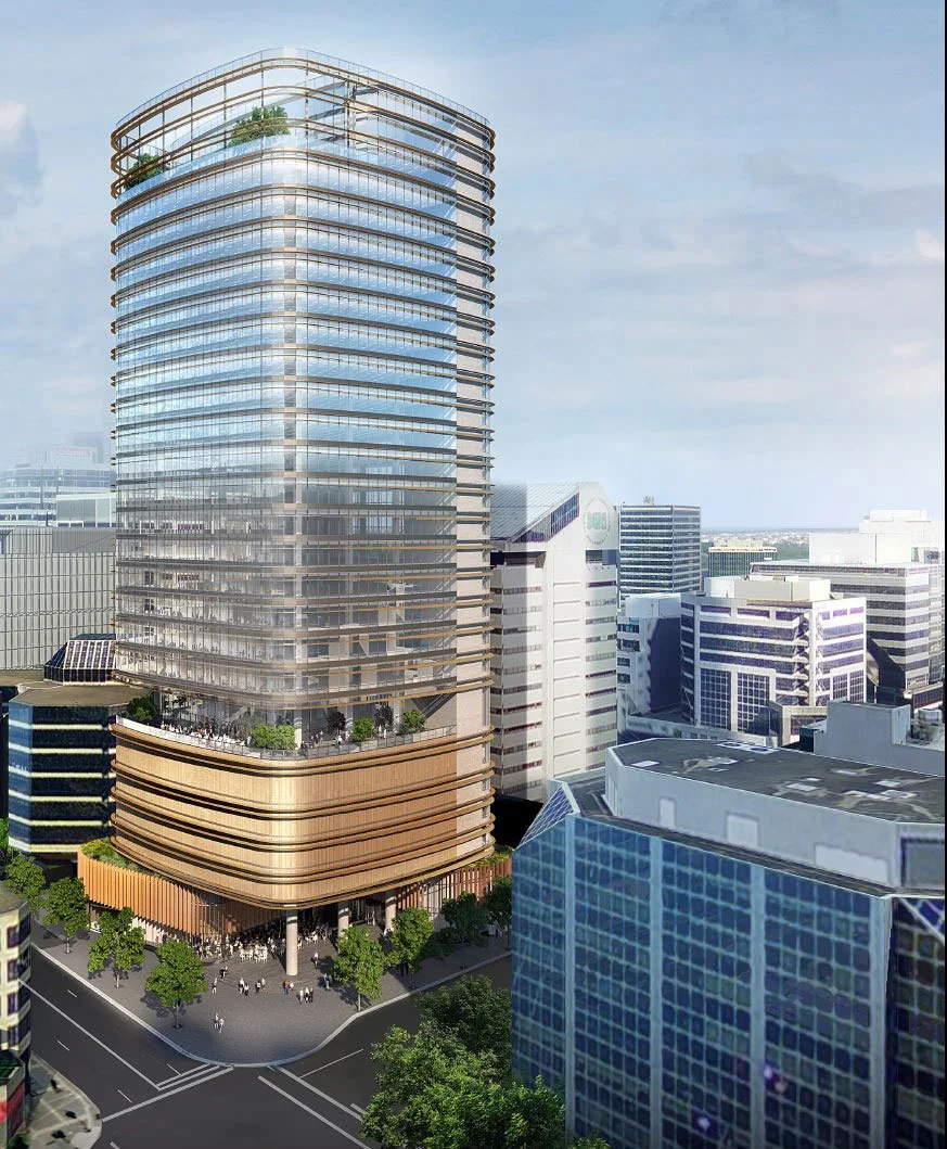 A tall, modern glass office building in a city skyline with a curved wooden base and rooftop gardens.