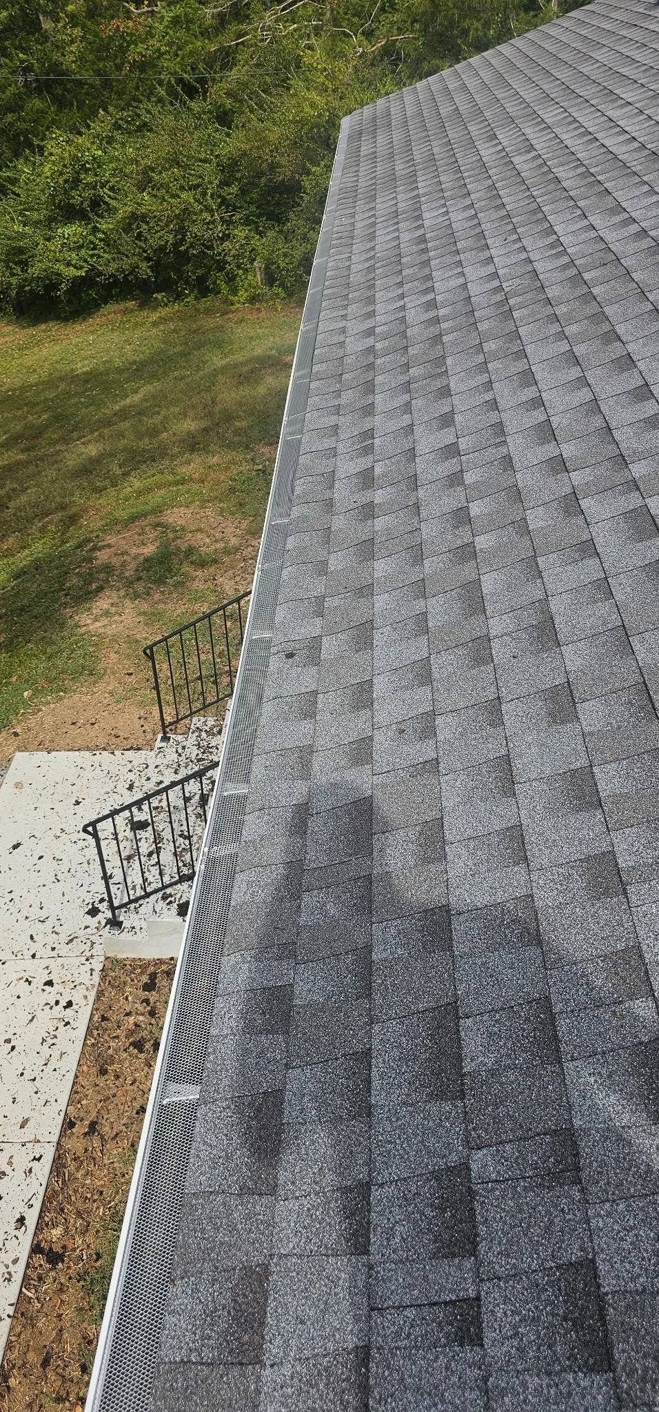 Gutter guards installed along the roofline of a home in the Brentwood area