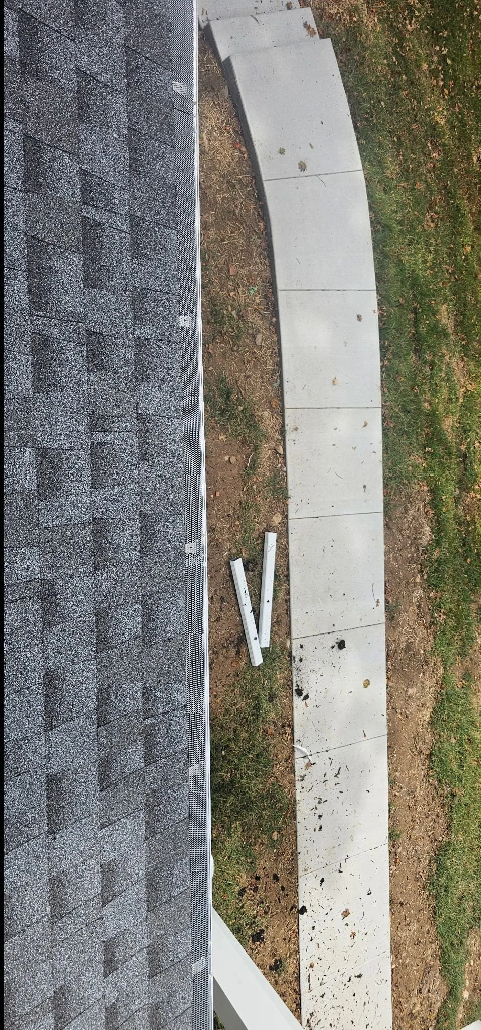 Top-down view of a mesh gutter guard installed on a home in the Brentwood area