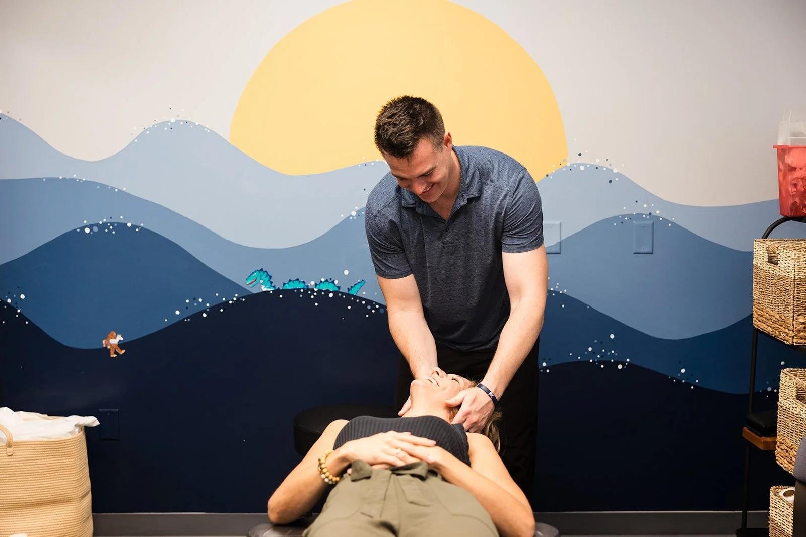 Patient receiving neck chiropractic adjustment for neck pain care