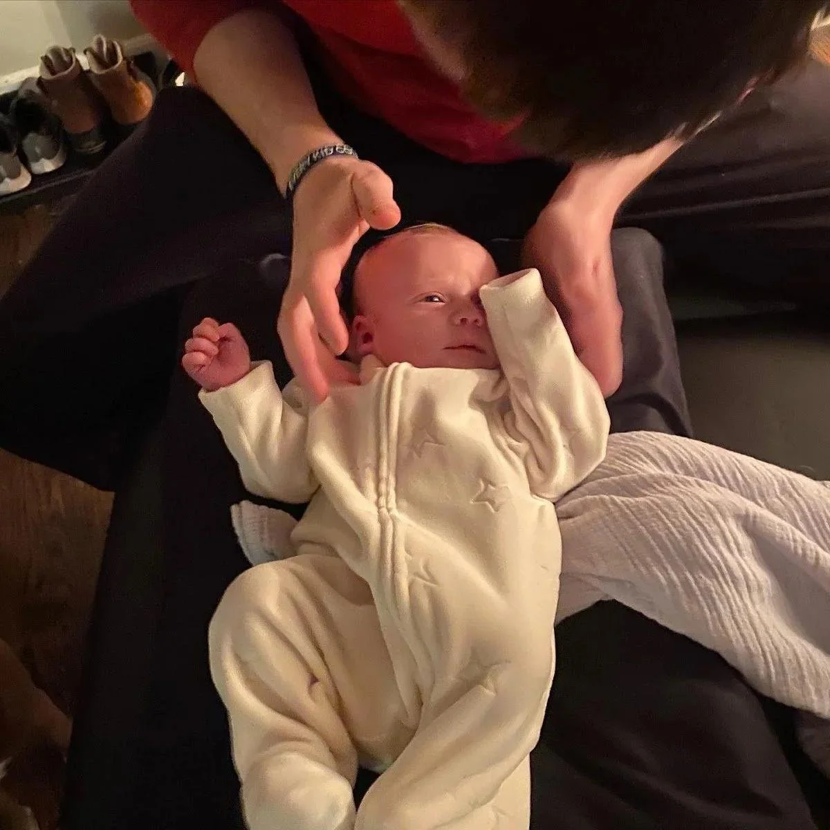 Infant receiving gentle chiropractic care for tongue tie treatment in Liberty MO