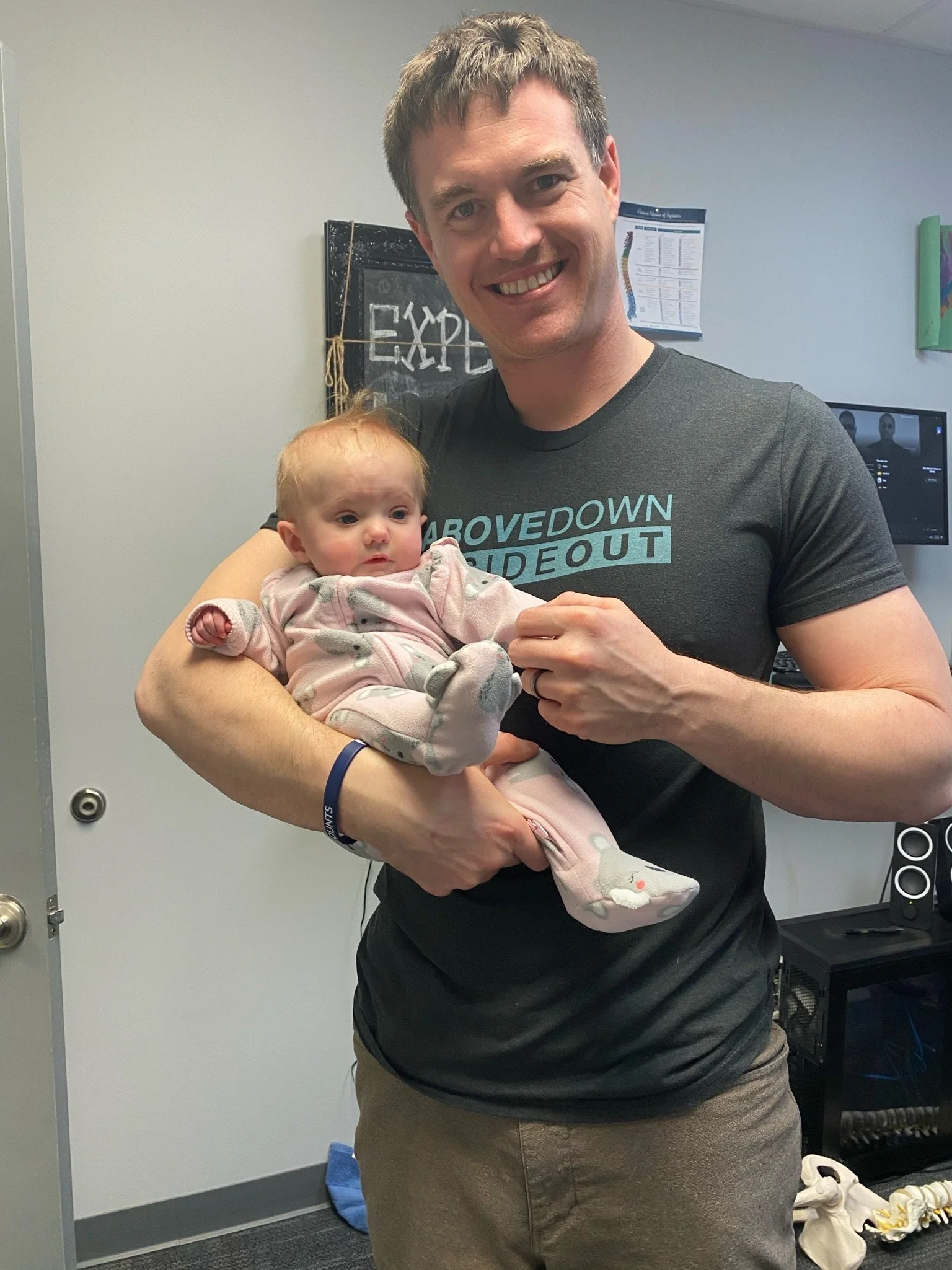 dr-g-holding-infant-liberty-mo.jpg
