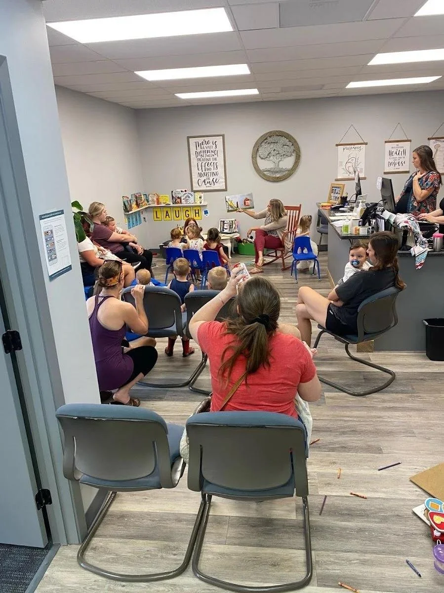 Family-friendly waiting room with blue chairs