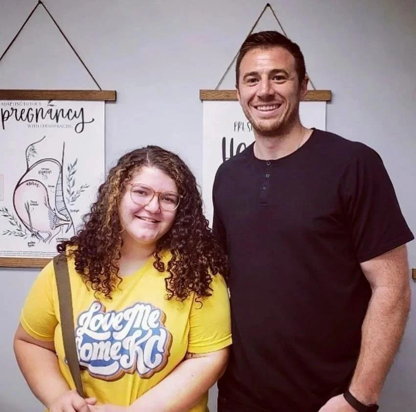 Pregnant woman and Dr Garrett Smith smiling during dry needling visit