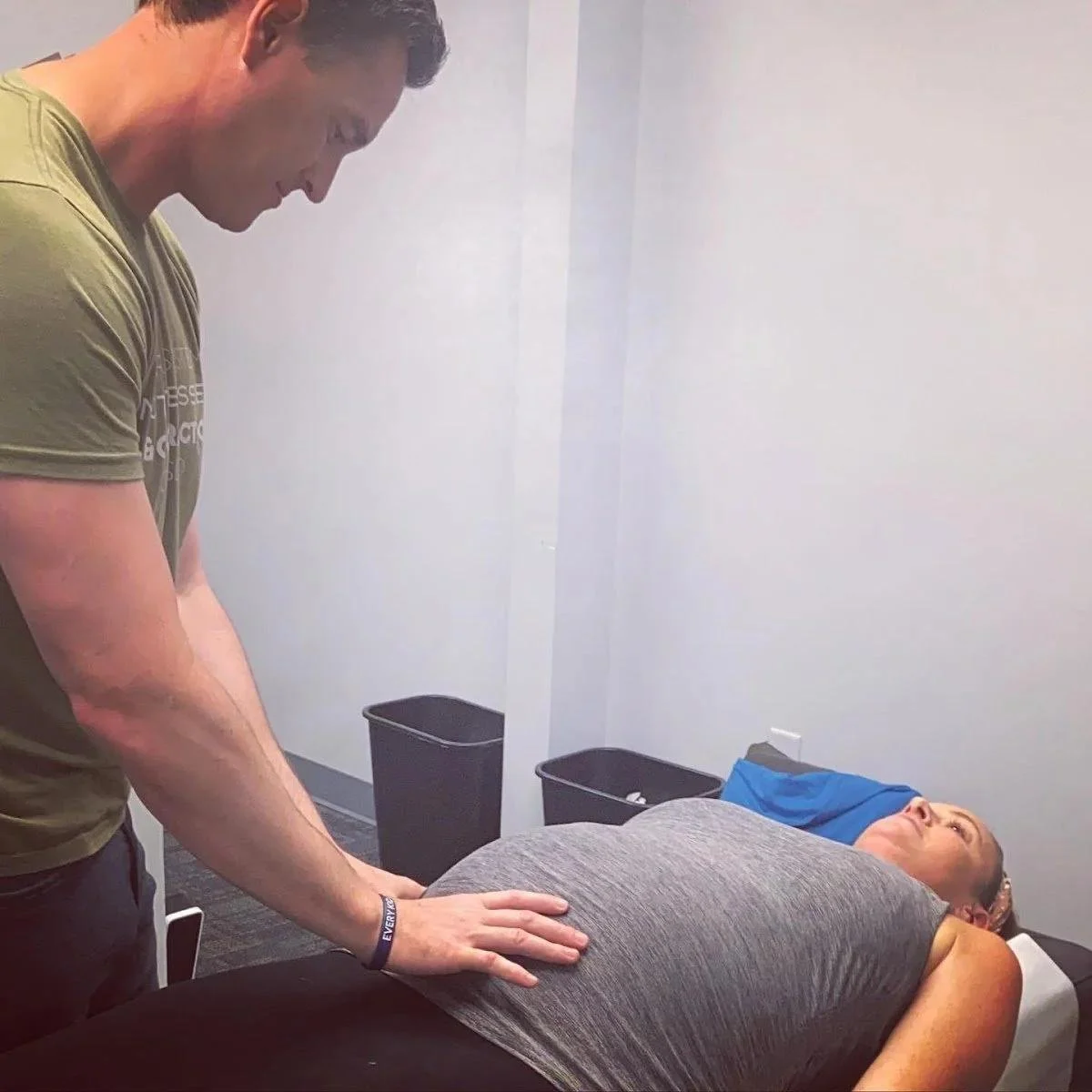 Pregnant woman on pregnancy-specific table during Webster Technique
