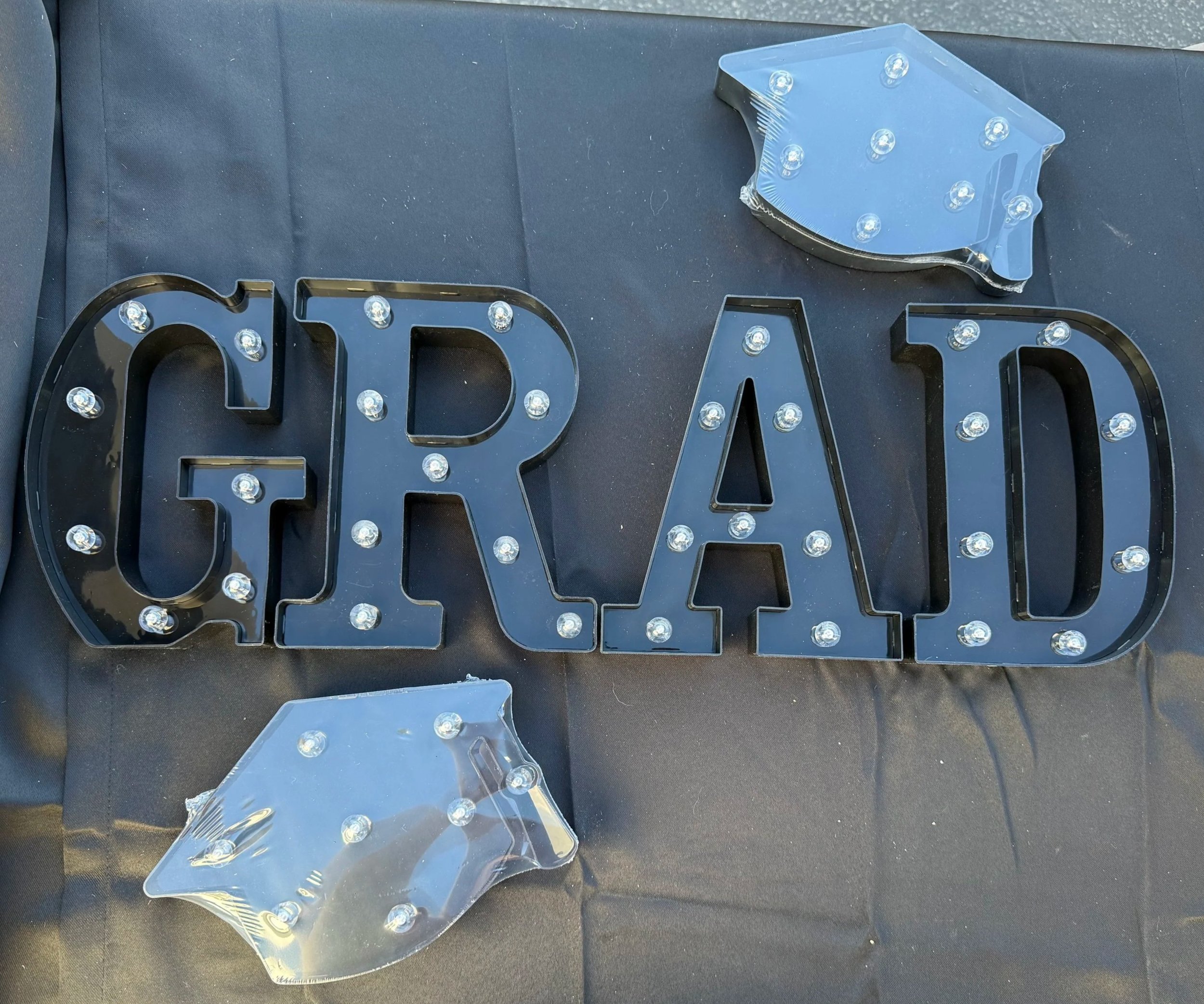 Graduation Marquee Letters & Caps
Pickup or Delivery — $10 per set

(includes “GRAD” marquee letters and 2 marquee grad cap signs)
(delivery fee based on mileage)