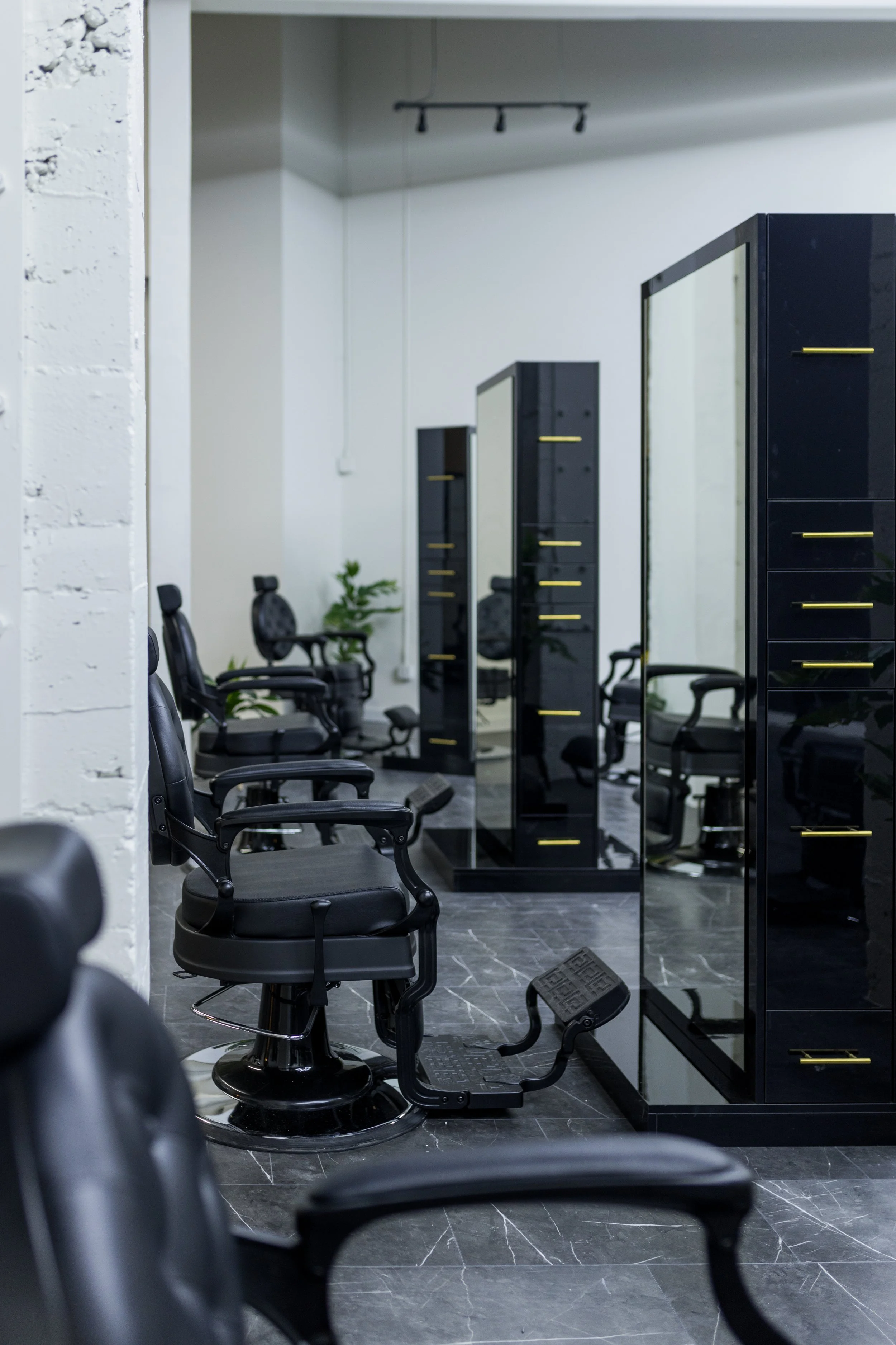 PDK corp_Capitol Hill_028 Barber School_Tenant Improvement_interior with barber chairs.jpg