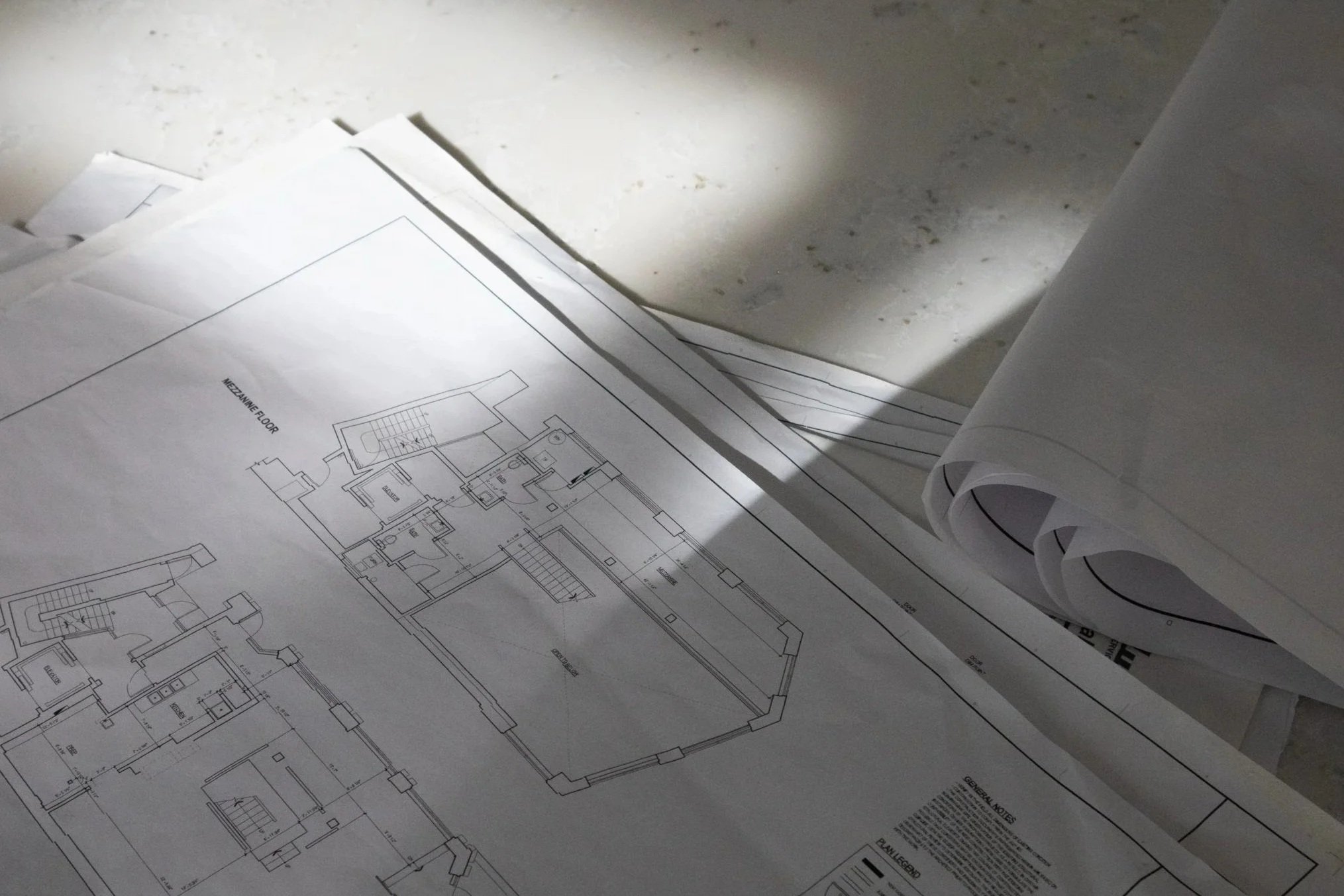 Detailed architectural blueprints representing PDK Construction's comprehensive pre-construction and planning services.