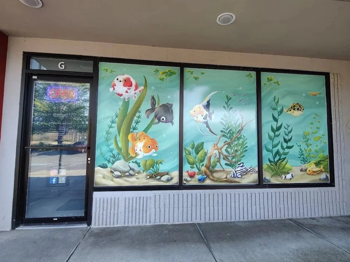 Exterior storefront of Moonlight Aquatics in Mill Creek, WA, showcasing completed tenant improvement and commercial retail facade by PDK Corporation.