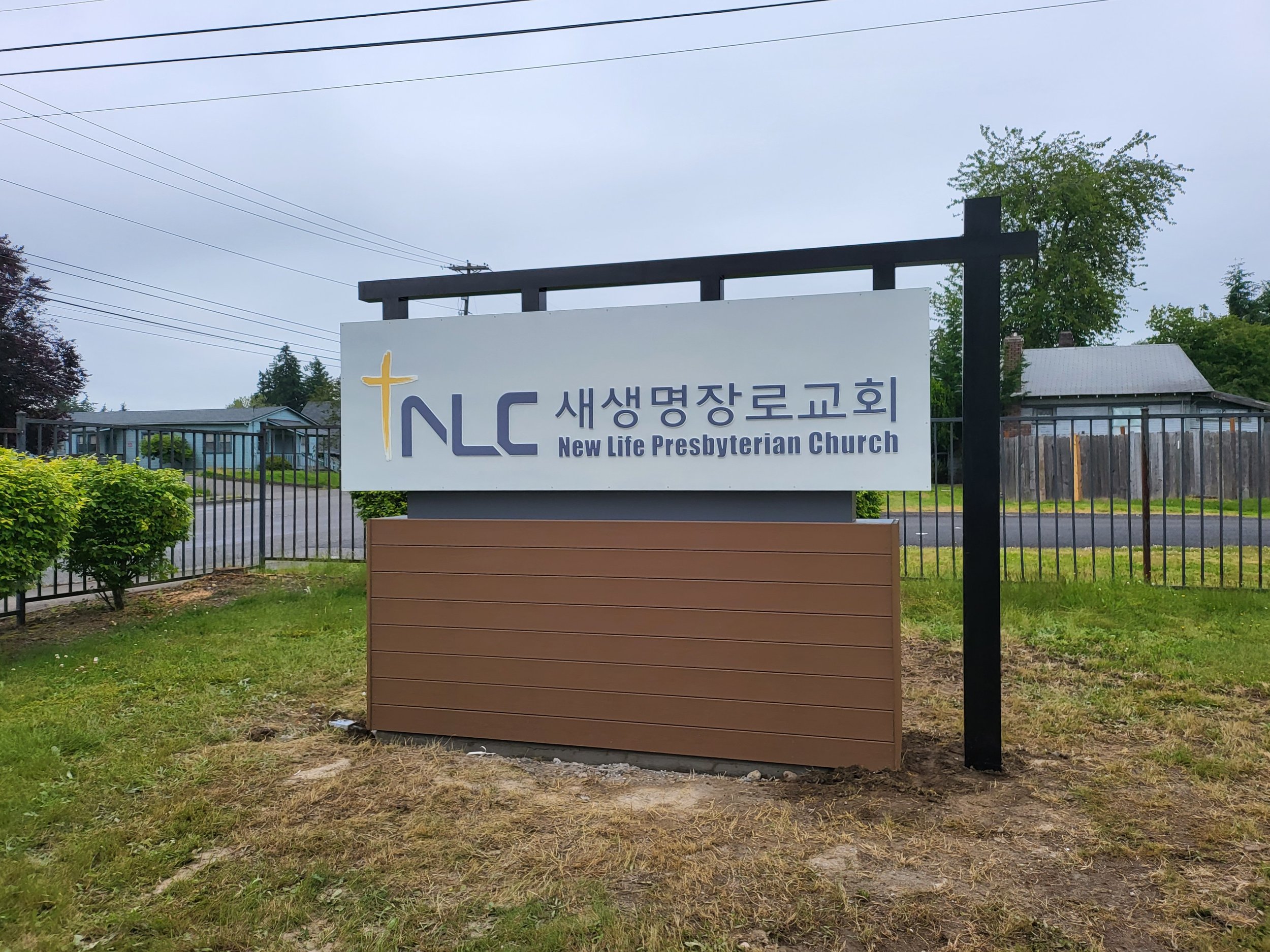 New commercial monument signage and exterior site improvements for Tacoma religious facility revitalization.