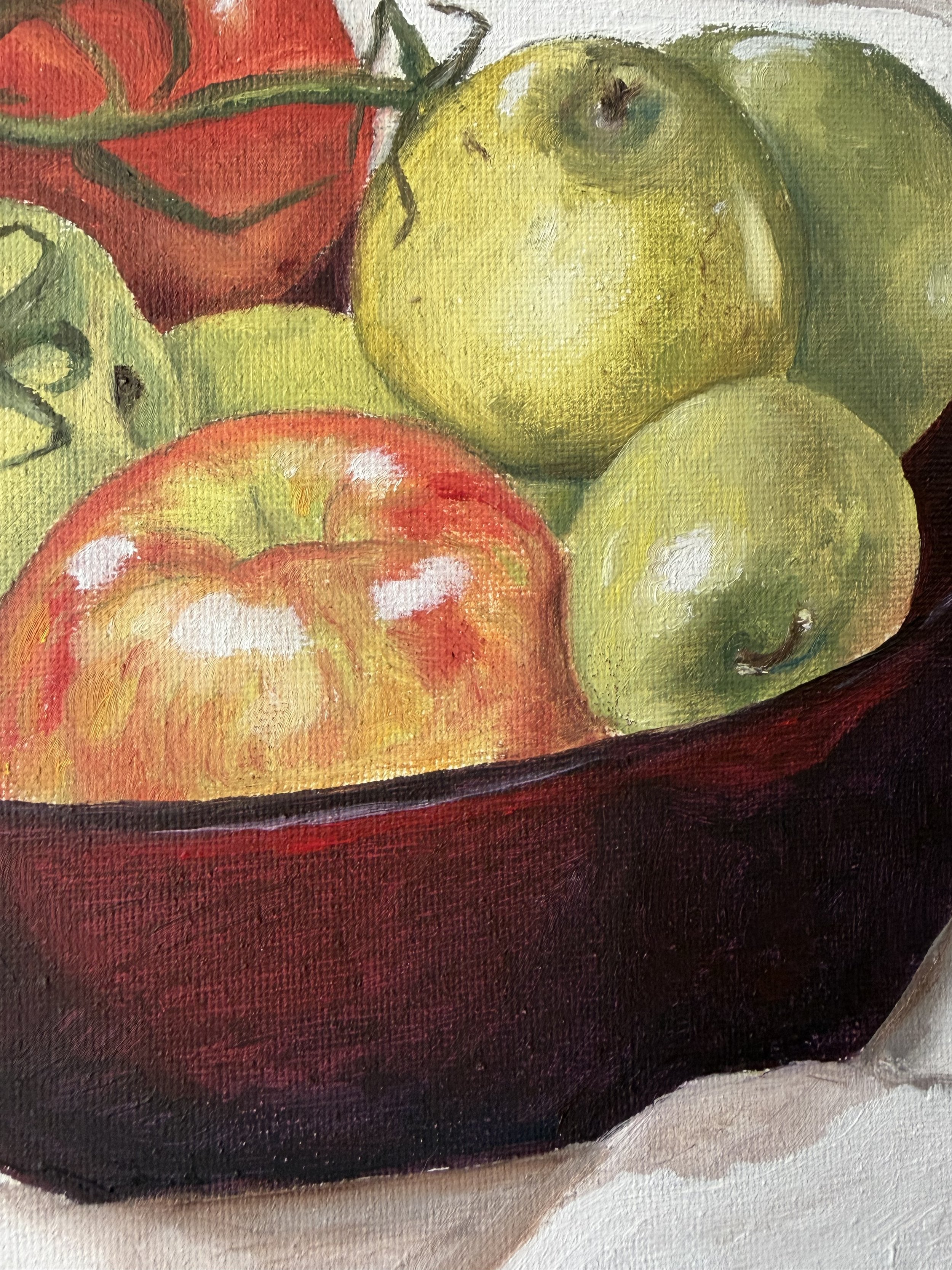 Close-up of a still life painting of tomatoes with green stems, dark, red, and green tomatoes on a dark surface.