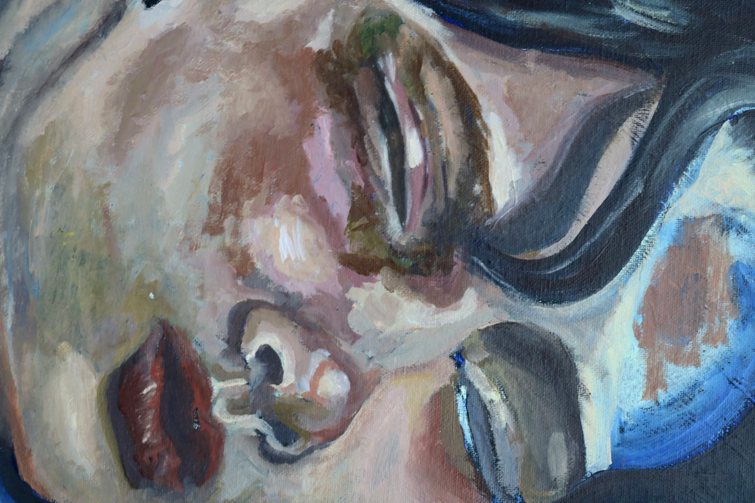 Close-up of an expressive, colorful abstract portrait of a woman with curly hair, painted with bold brushstrokes.