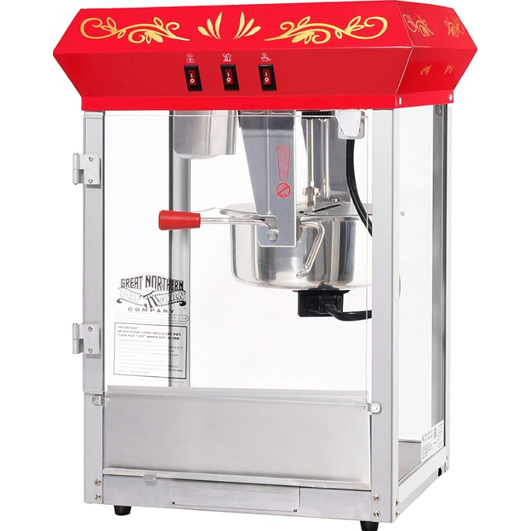 Vintage stainless steel cotton candy machine with a red decorative cover on top.