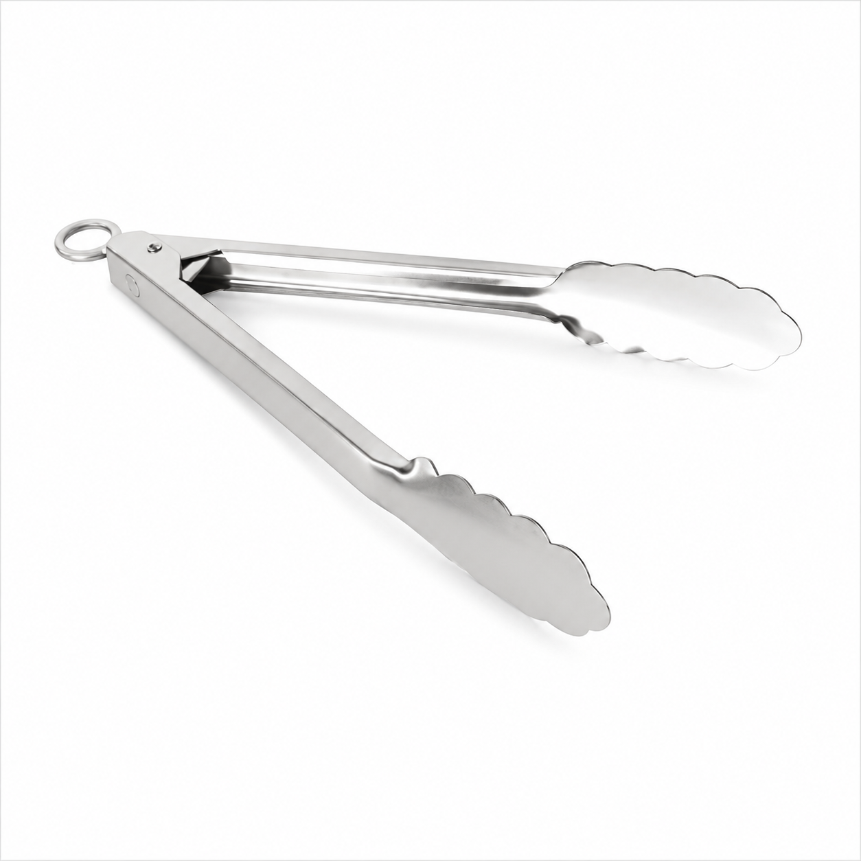 Stainless steel tongs with scalloped edges on a white background.