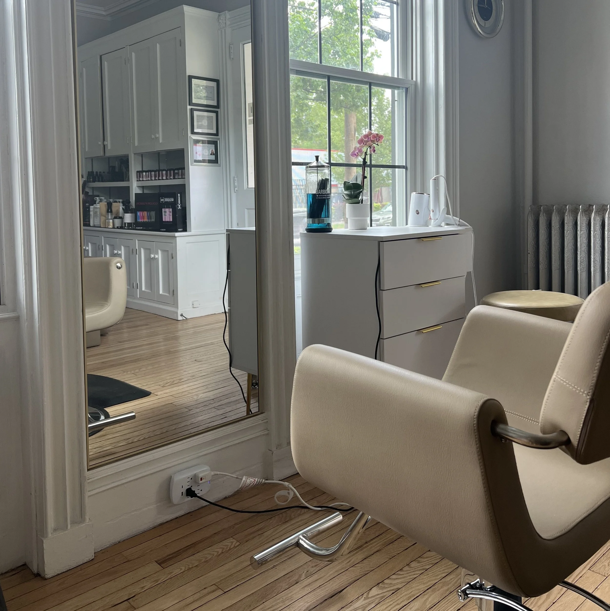 salon chair facing mirror
