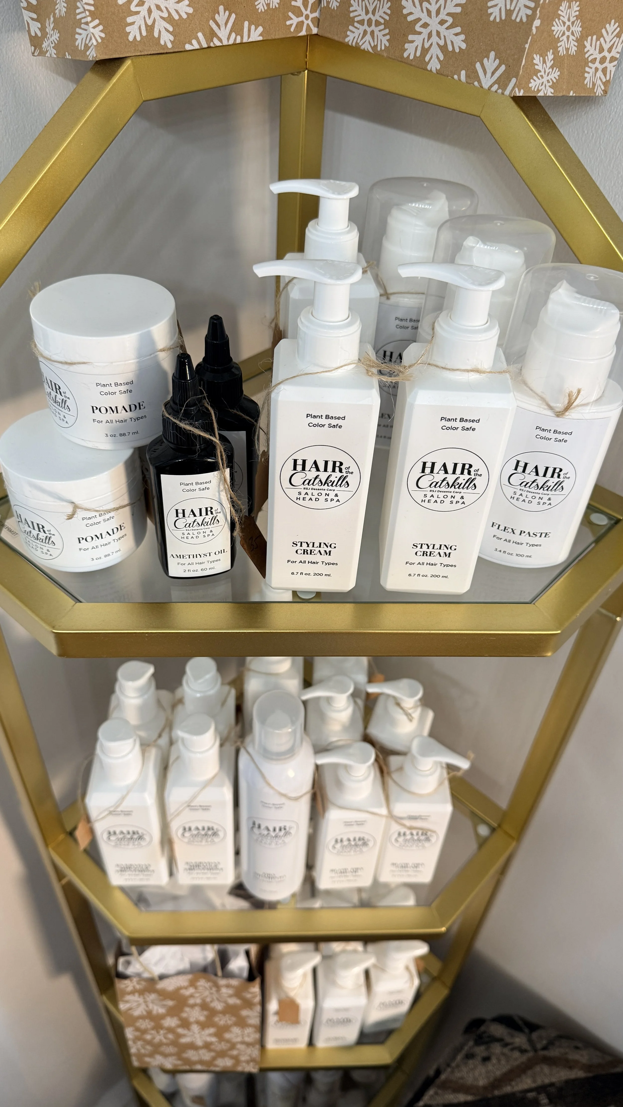 Hair of the Catskills hair product on gold shelving