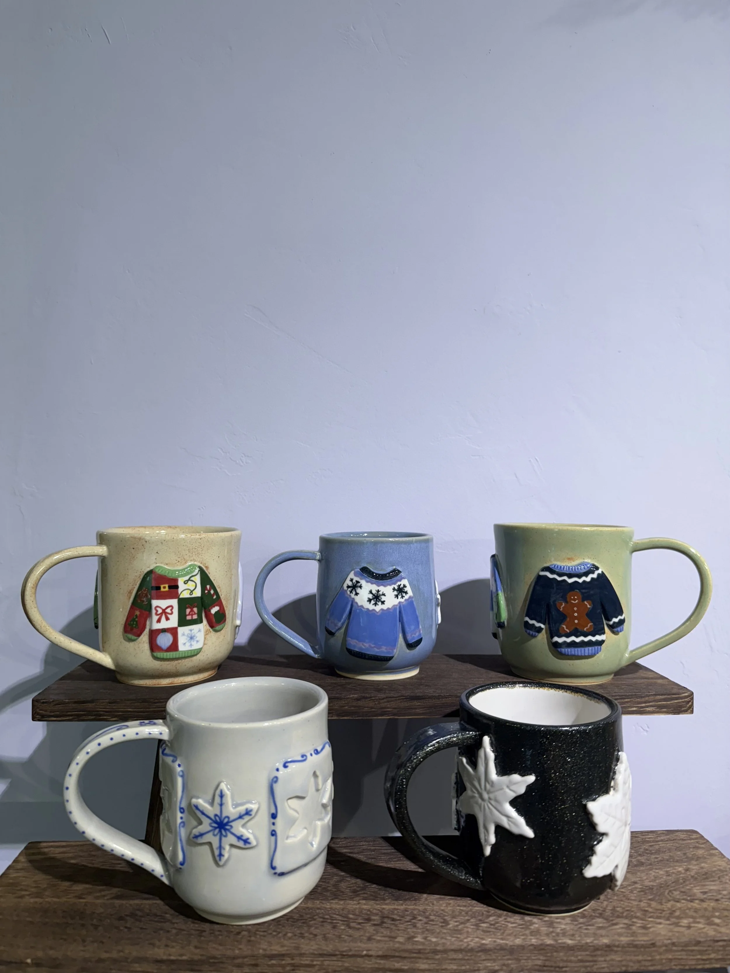 Collection of Holiday mugs, 2025