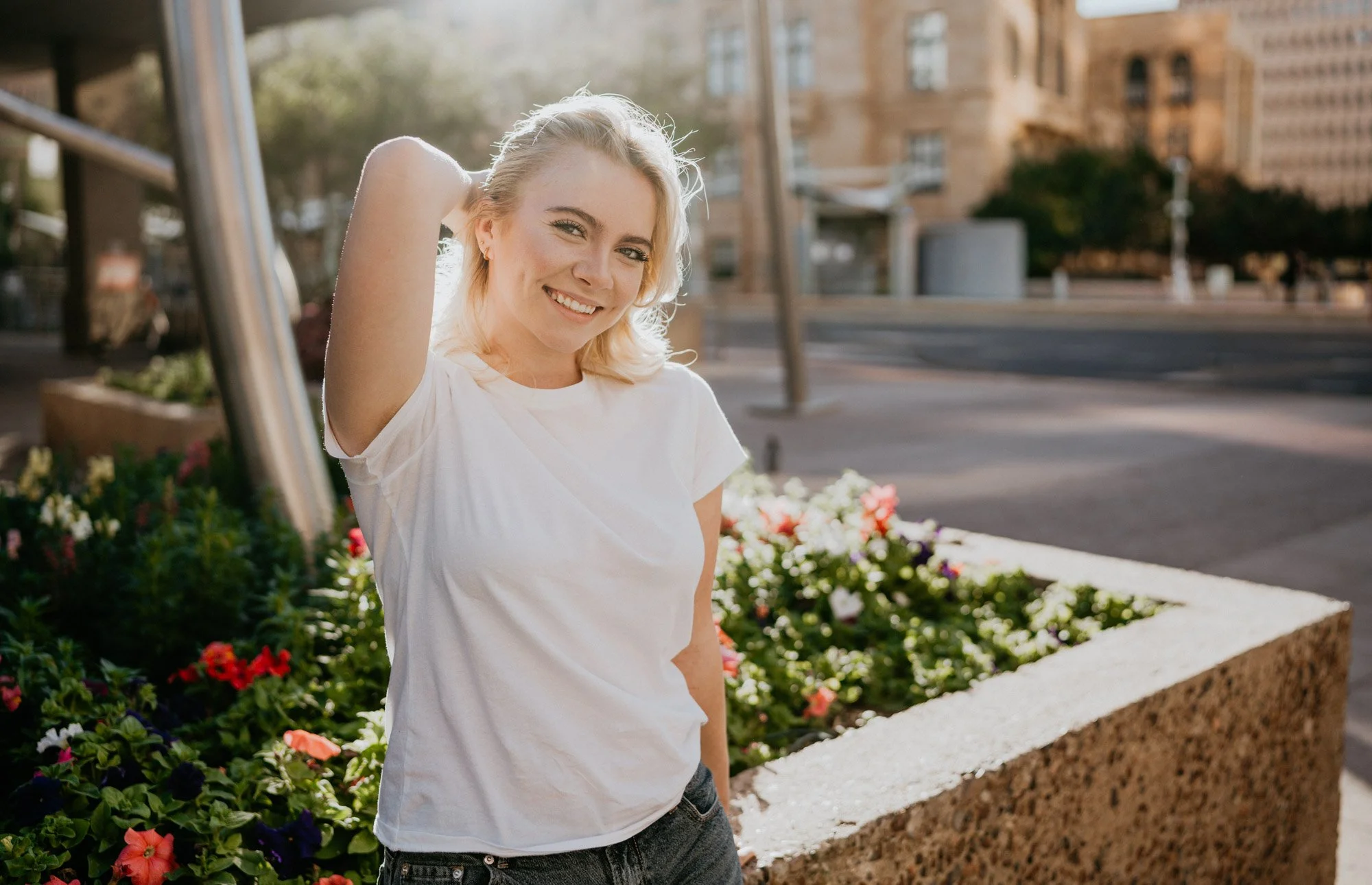 Young female running her hands through her hair