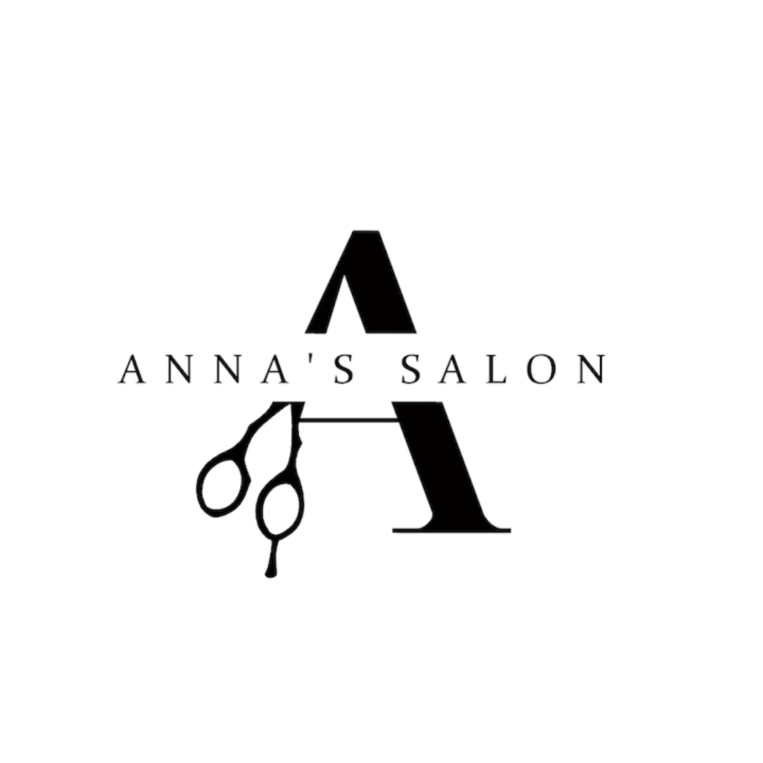 Elegant black minimalist logo on a dark background. A large stylized capital "A" integrates hairdressing scissors forming the crossbar and legs of the letter. Below it, the text"Anna's Salon" in thin uppercase letters.