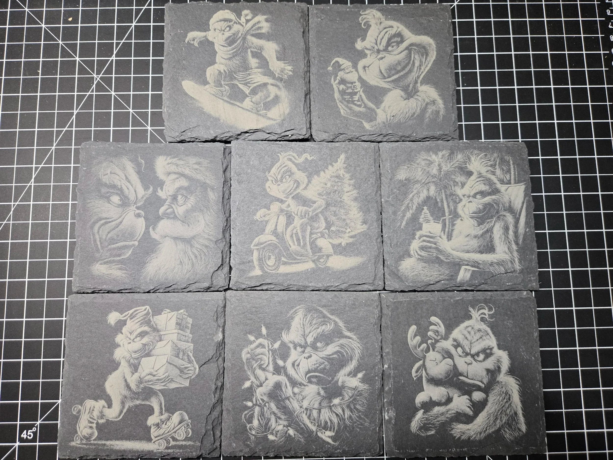 Set of nine black and white engraved tiles with fantasy-themed characters, including a turtle on a skateboard, a goblin with a cigarette, a monster with a beard, a rider on a scooter, a wise old troll, a squirrel with gifts, a mischievous elf, and a 