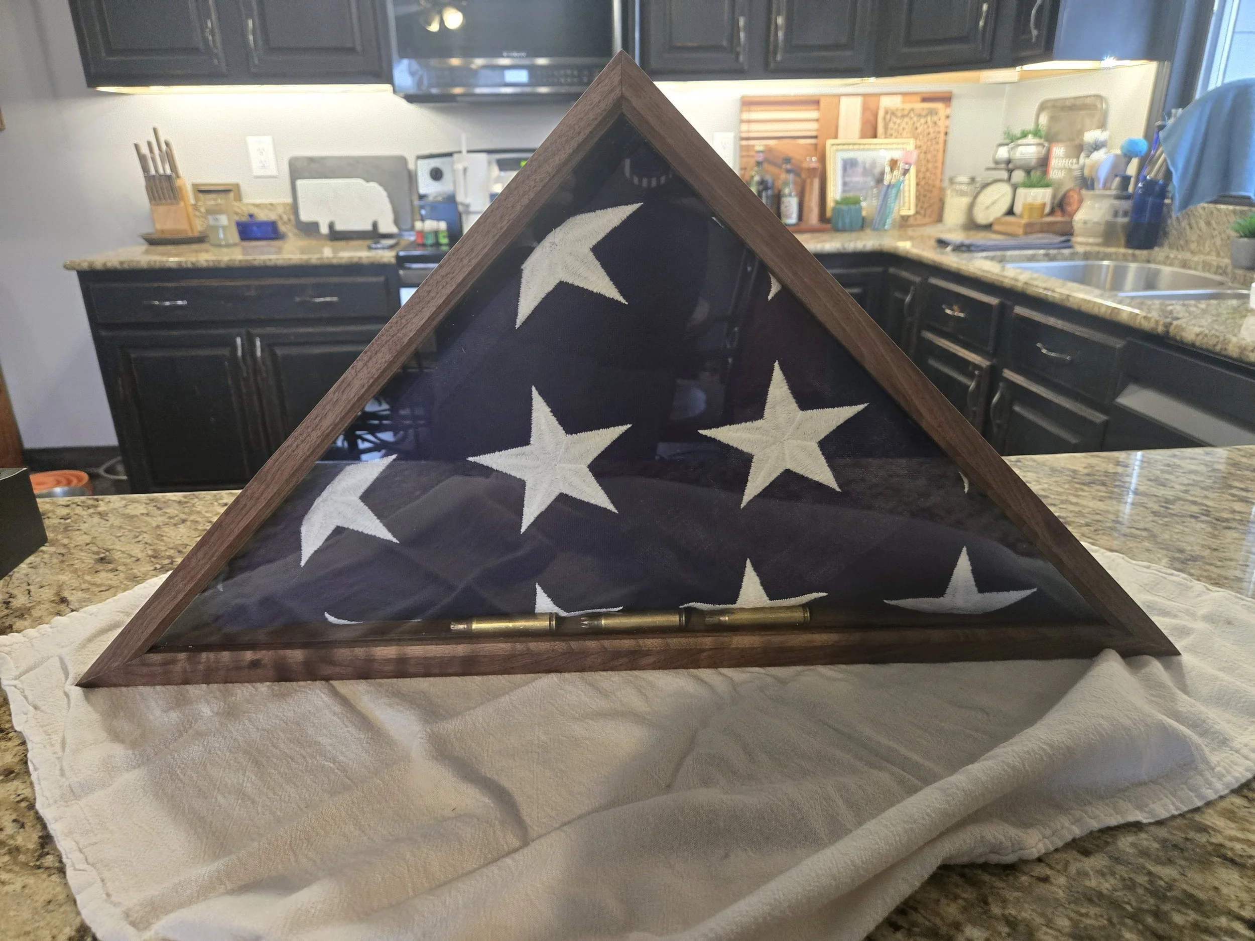 wood flag display case. built in various wood species and finishes.