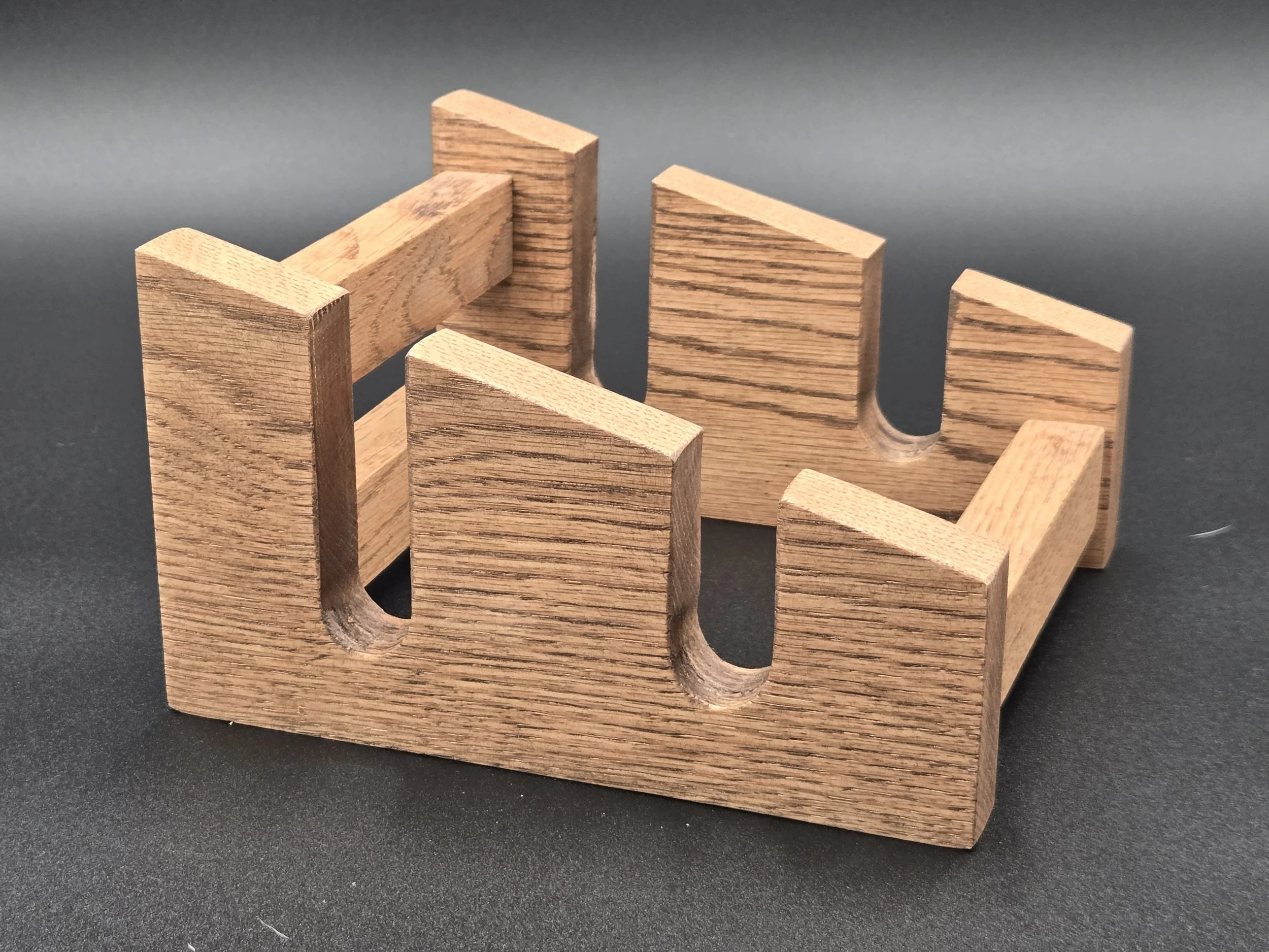 Cutting board holders with 2 ore 3 slot variations.