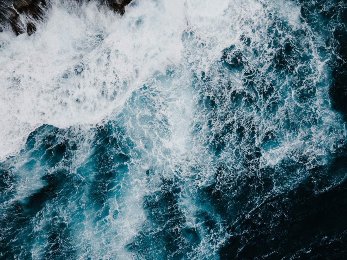 waves crashing on a shoreline