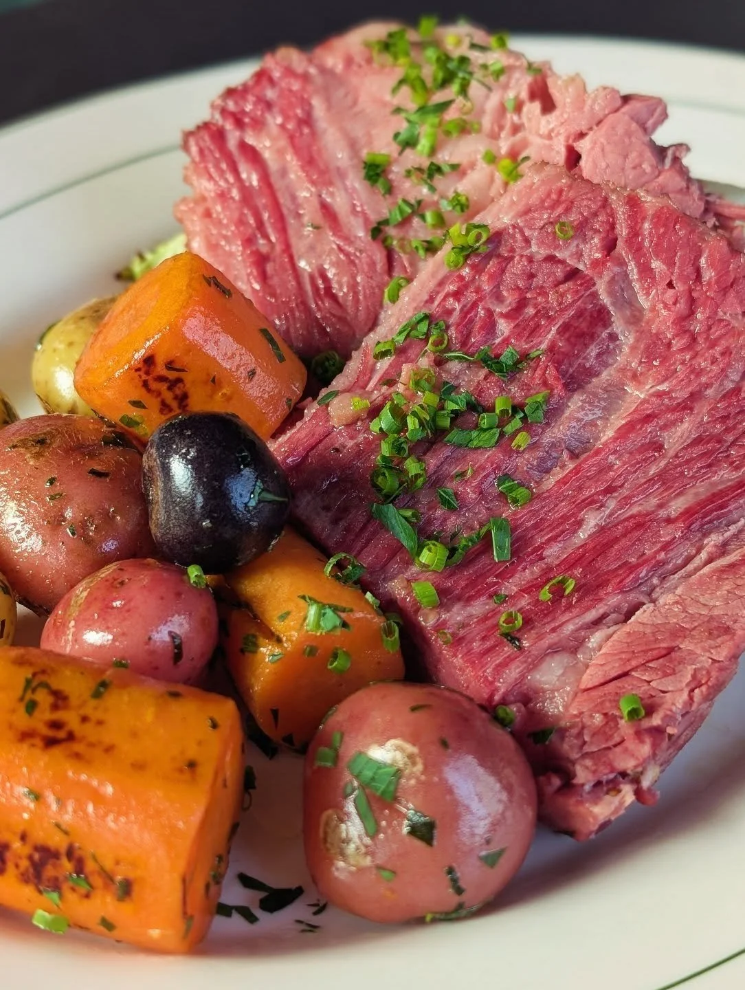 House beer braised corned beef, buttered carrots and cabbage, parsley marble potatoes ☘️