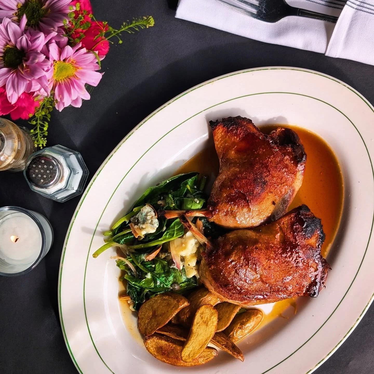 Duck Confit &bull; wilted spinach with shallot, almond, caper &amp; buttermilk blue, red wine gastrique, fingerling potatoes