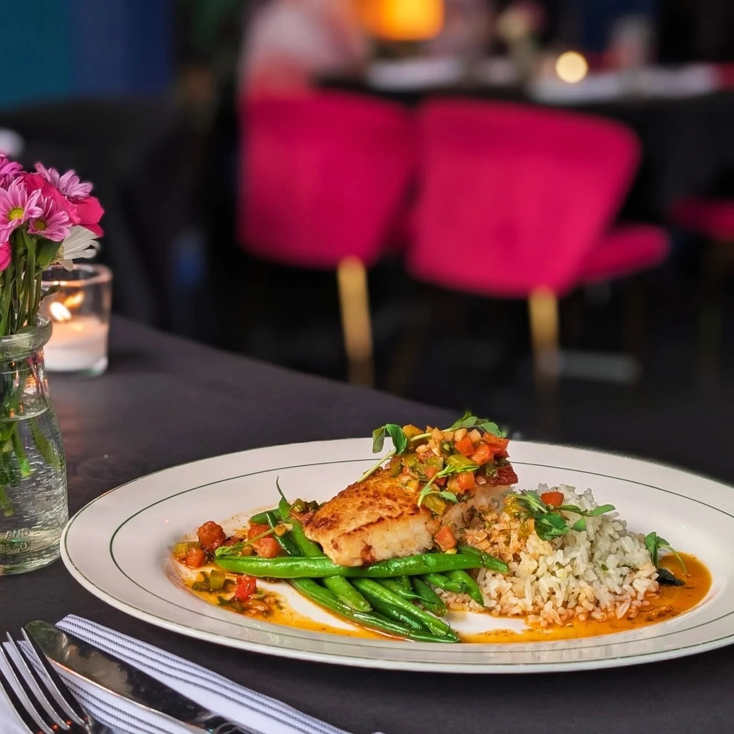 Seared Halibut with smoky red chimichurri, herb roasted haricot vert, and lemon herb rice pilaf