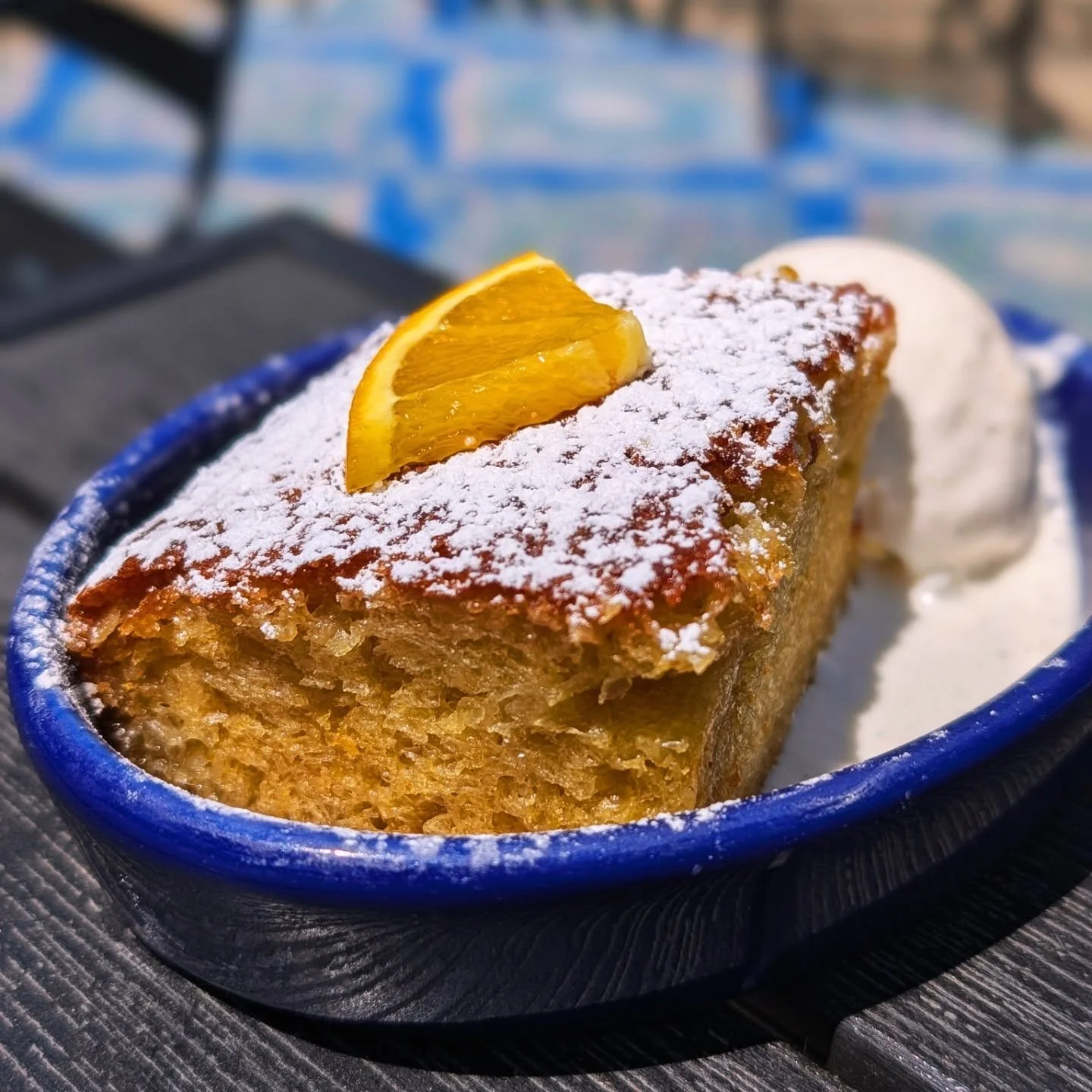 Sudden sweltering heat means Portokalopita with cool creamy vanilla bean ice cream 🍊