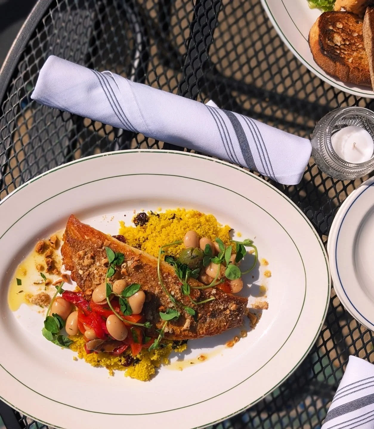 Mediterranean Style Imperial Snapper with marinated butter beans &amp; olives, saffron couscous with dried cherries &amp; mint, hazelnut breadcrumb ☀️
