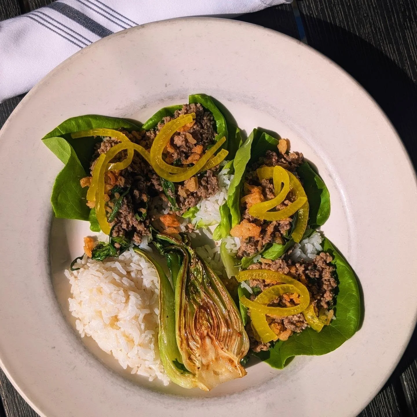 Laotian Chicken Larb Lettuce Wraps with fish sauce &amp; lime marinated ground chicken, pickled onions, cilantro, basil, mint, crispy rice ✨