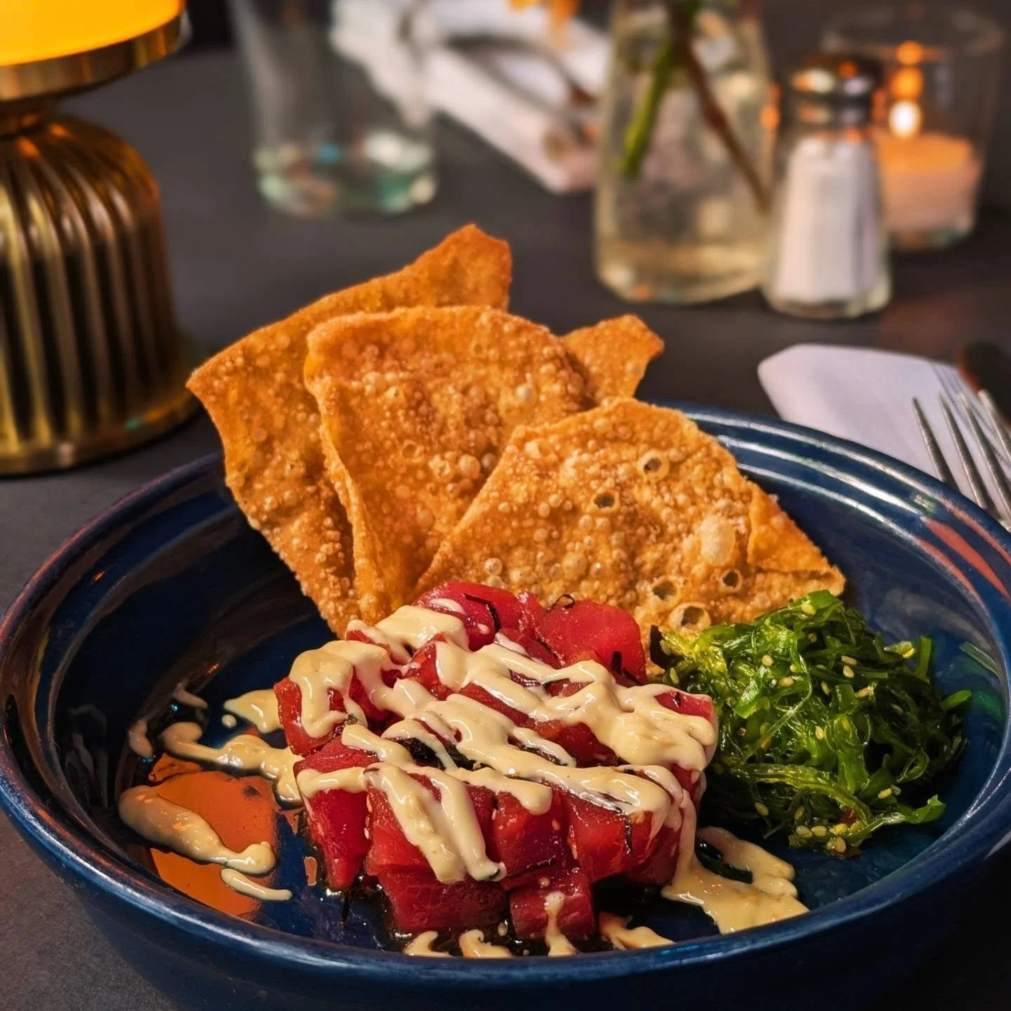 Ahi Tuna Poke with wakame, pickled ginger aioli, sesame oil, crispy wonton chips, nori 🐟 🥢