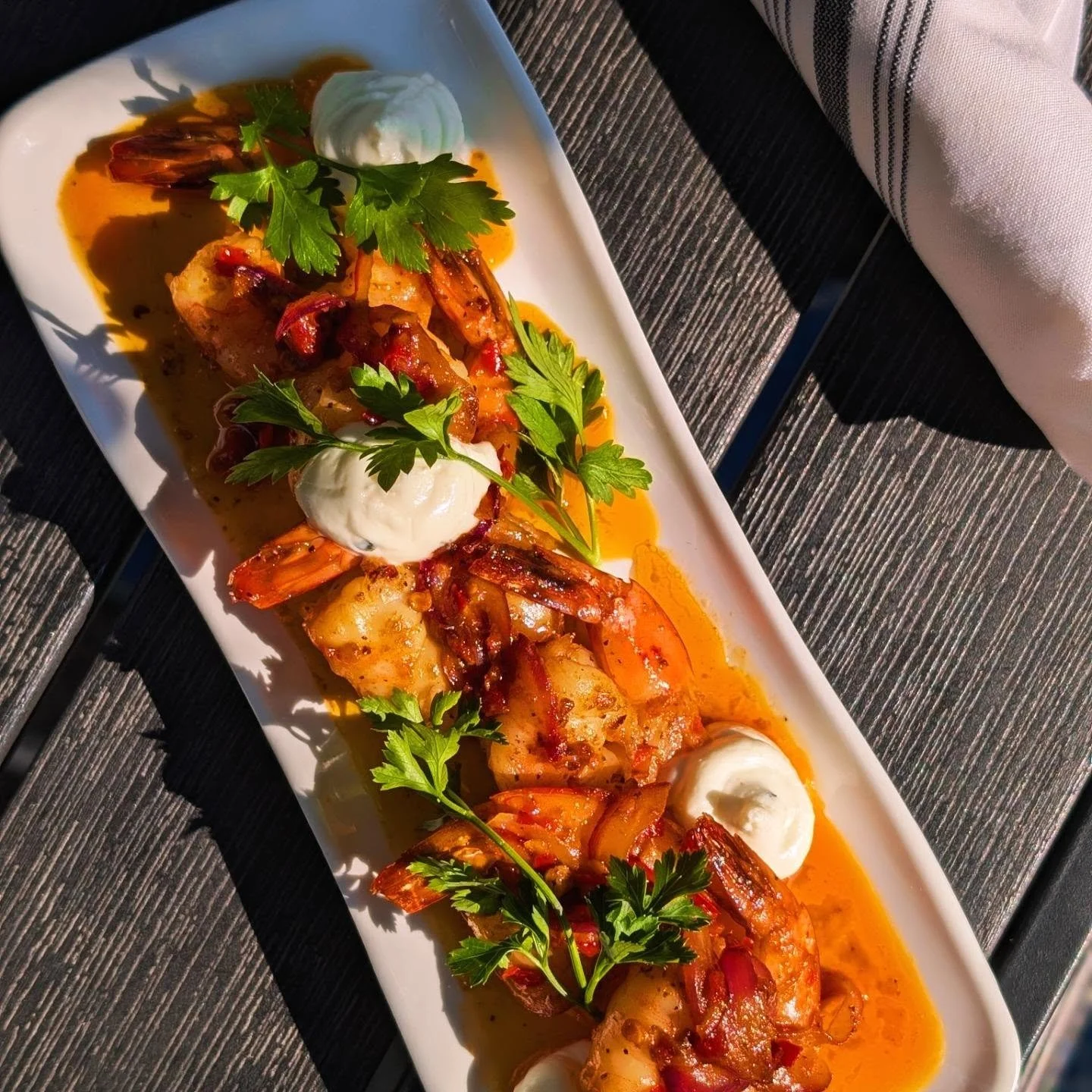 Calabrian Chili Shrimp &bull; orange calabrian chili sauce, sauteed red onion &amp; garlic, whipped chevre, parsley