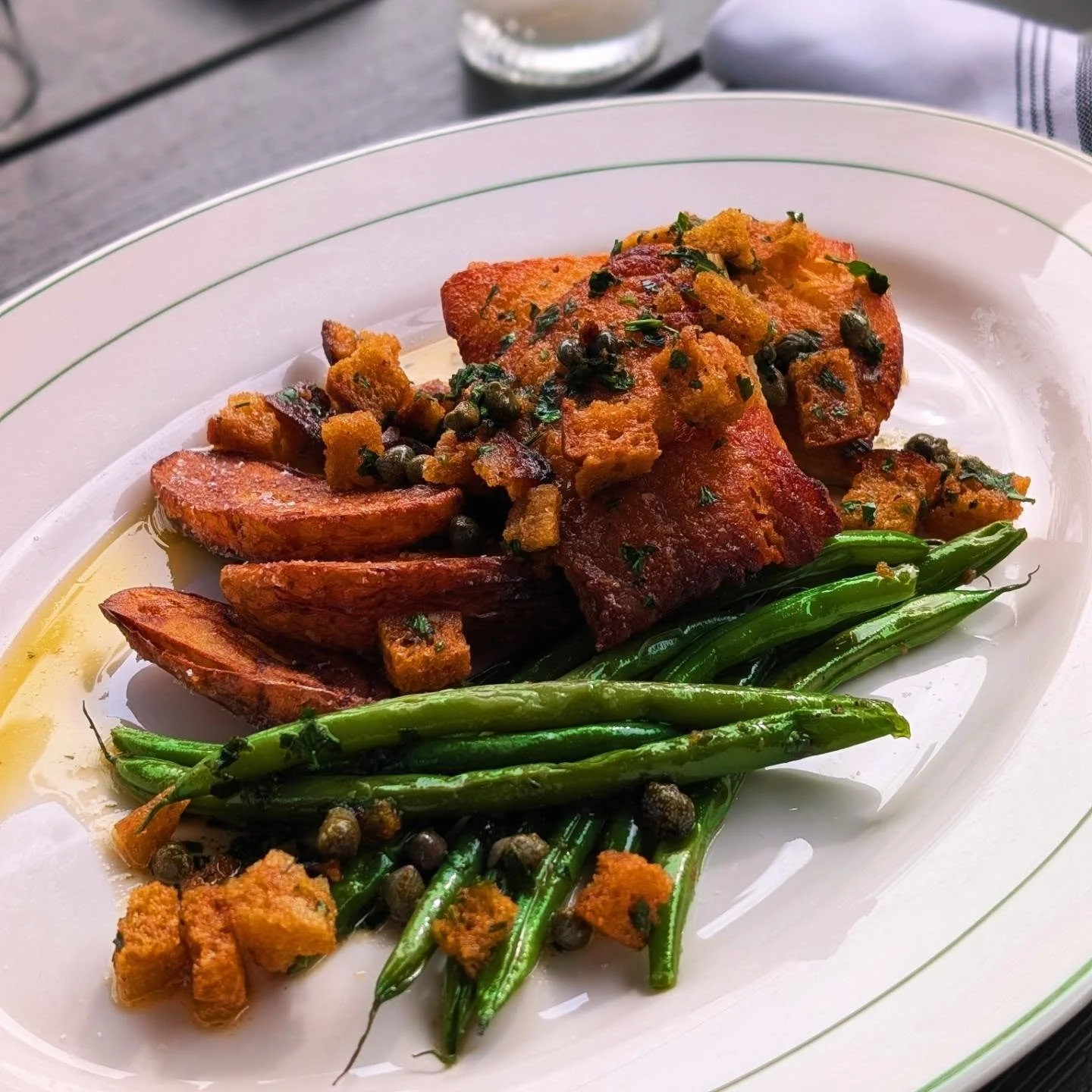 One of our delicious entree features tonight! 
Black Cod Grenobloise &bull; caper, lemon, buttered crouton, garlicky haricot vert, salt roasted fingerling potatoes, parsley