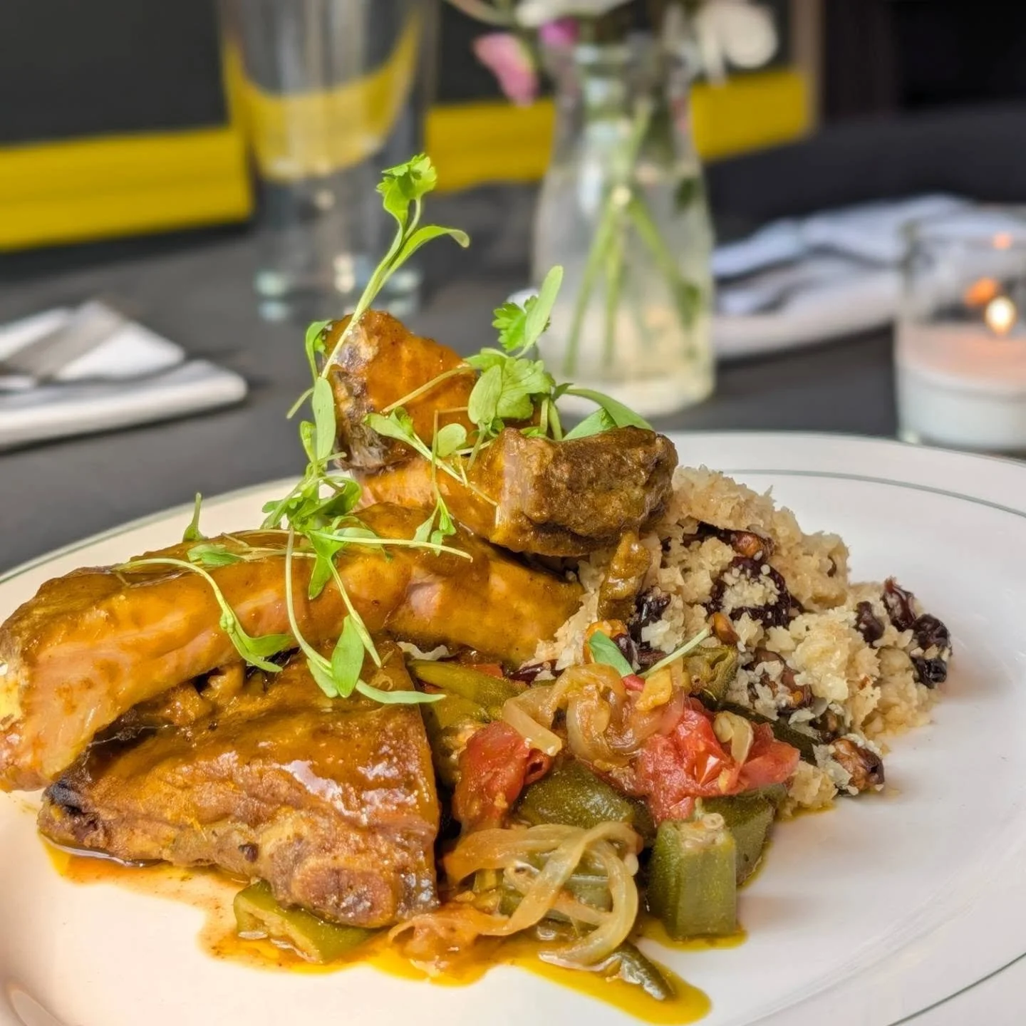 Curried Caramel Baby Back Ribs &bull; four sweet and savory bones, jeera cauliflower cous cous, bhindi masala, sticky madras glaze