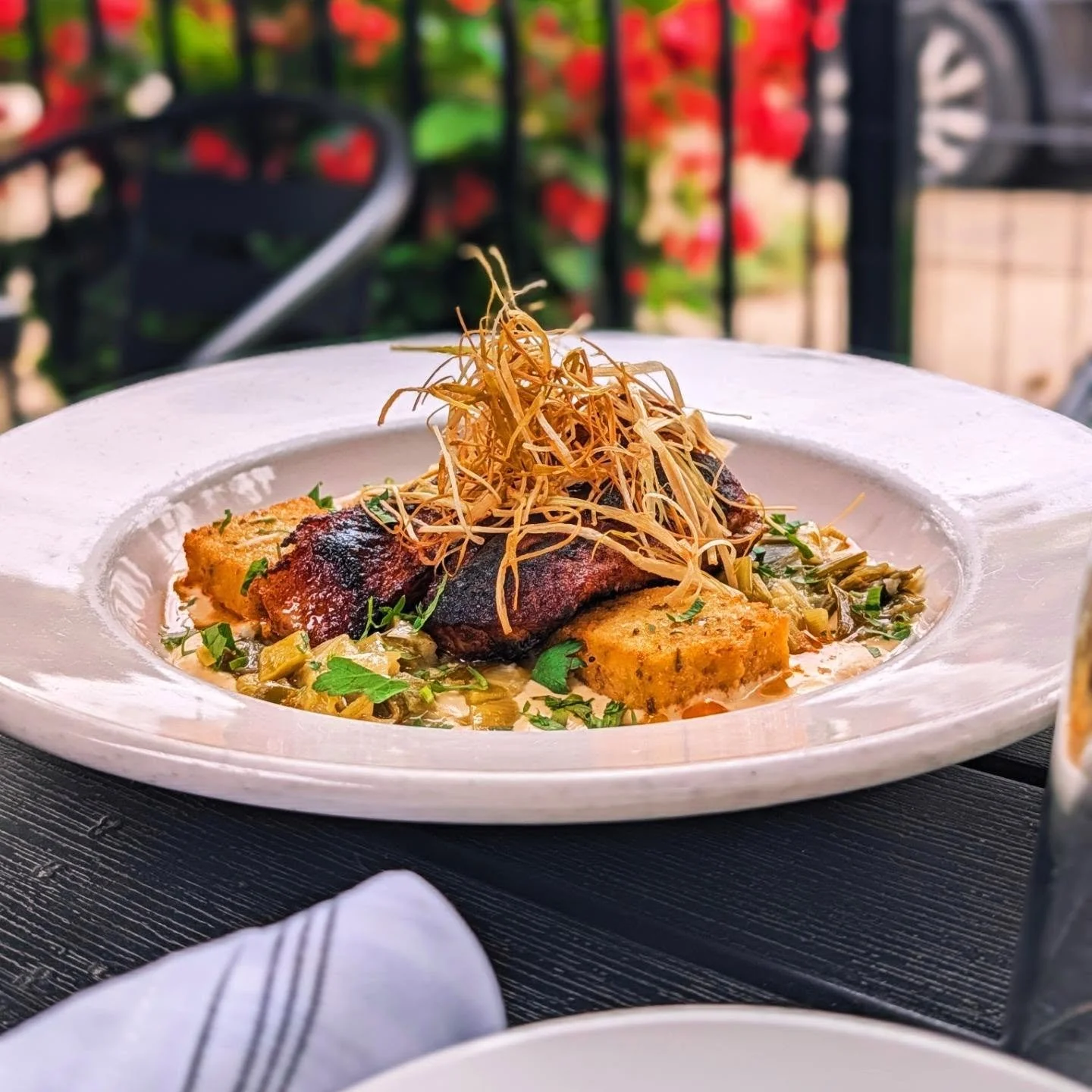 Delicious!! 🙌 Southern Style Blackened Cod &bull; sweet corn puree, crispy herbed polenta, creamed leeks, sweet smoked paprika oil