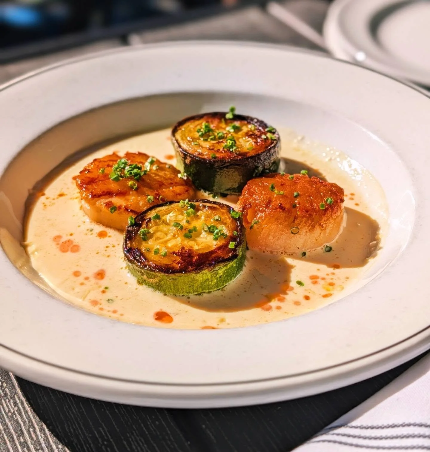 One of our small plates tonight &bull;
Seated Diver Scallops with sweet corn bisque, seared green squash, and fresh chive
