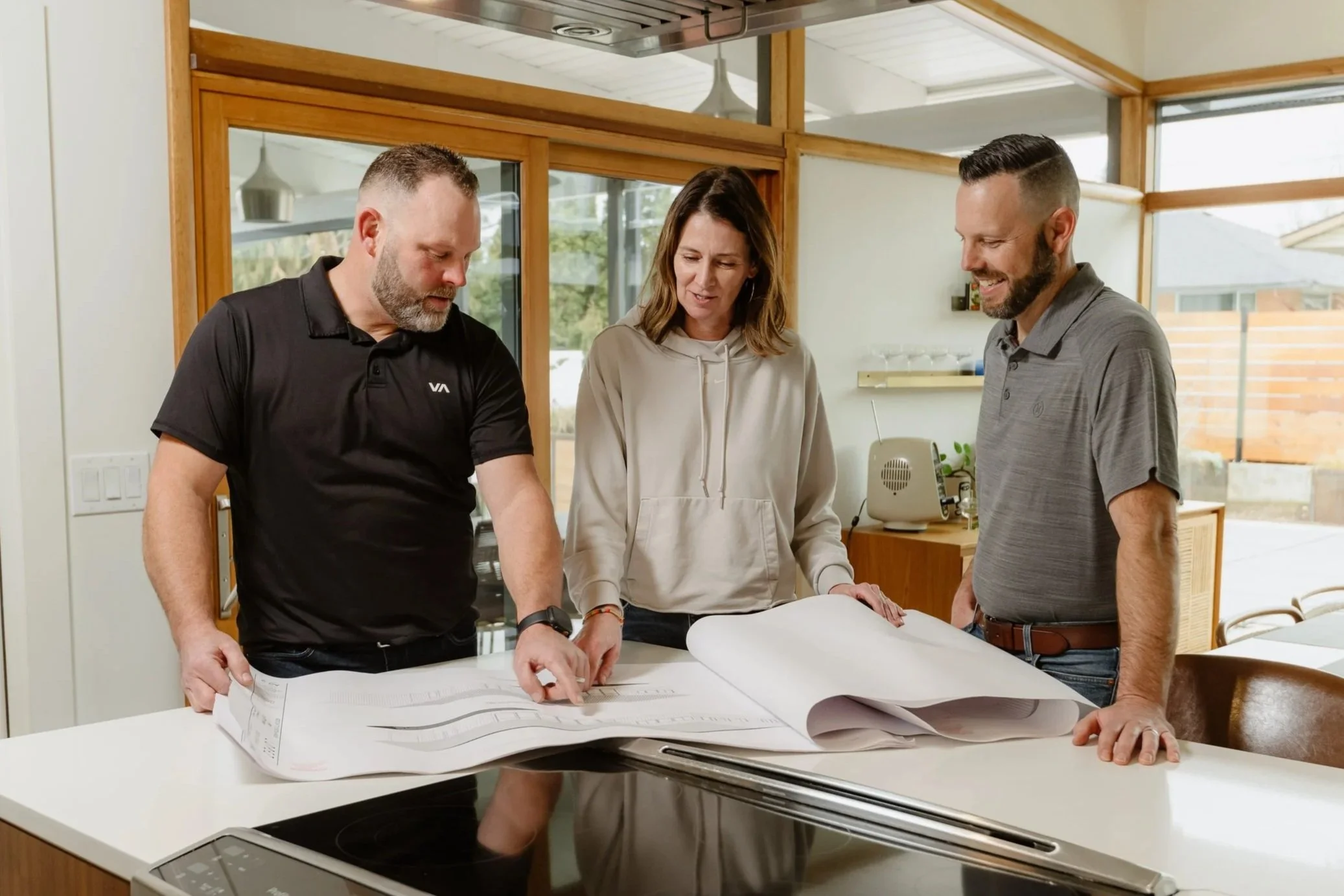 Butler Brothers Construction discussing designs with custom home customer