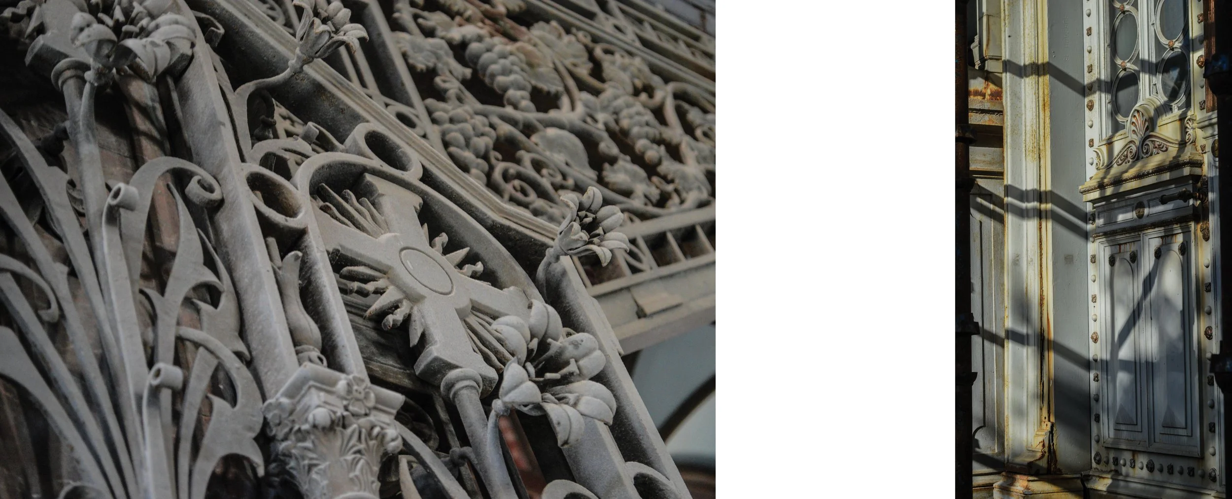 A close-up of ornate metalwork and rusted architectural details of a historic building, showing intricate design and weathering.